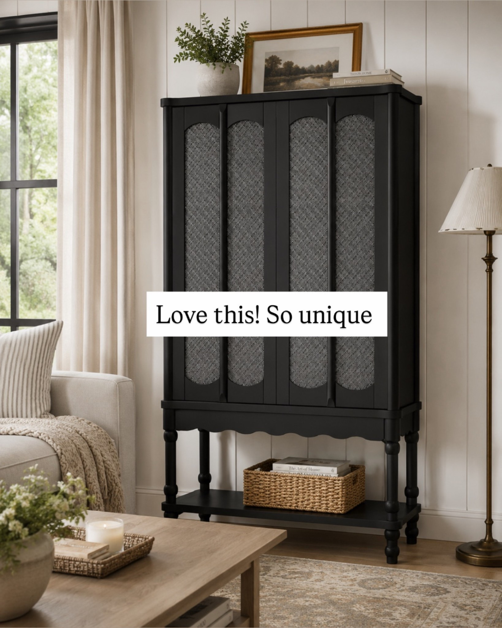 This black bookshelf is giving modern cottage charm. I love how the arched details and turned legs add so much character, while the open bottom shelf makes it perfect for baskets, books, and cozy decor.

Such an easy way to add storage and style to a family room! ✨
