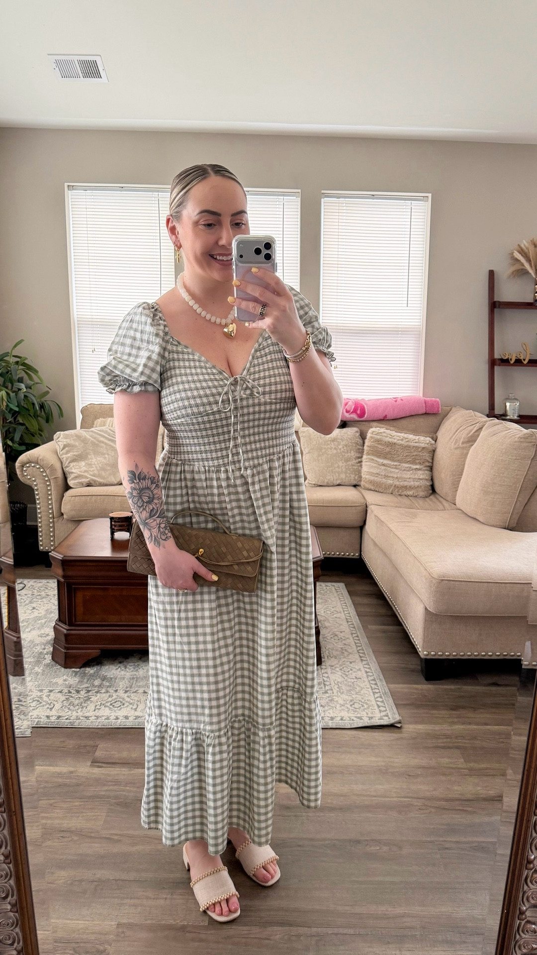 The sweetest gingham dress for spring 🌿

This green gingham midi dress is such a perfect spring and summer dress. I love the puff sleeves, tie front detail, and flowy fit, and it pairs perfectly with neutral sandals and a woven clutch.

Perfect for brunch, spring events, vacation dinners, or a weekend date night.

Fit: wearing size M sized down due to smocking 



#LTKTall #LTKootd