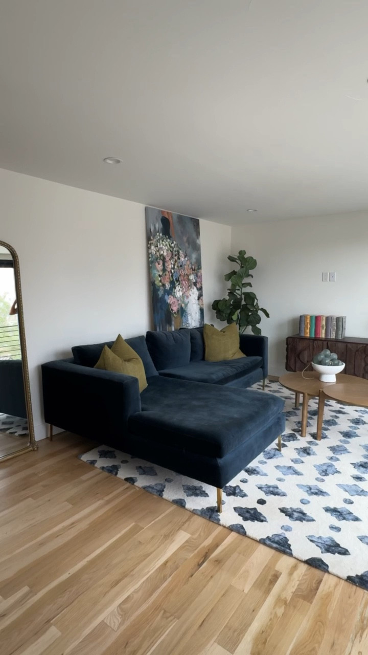 Sitting room furniture living room home decor blue velvet couch with nesting coffee table and console table. 