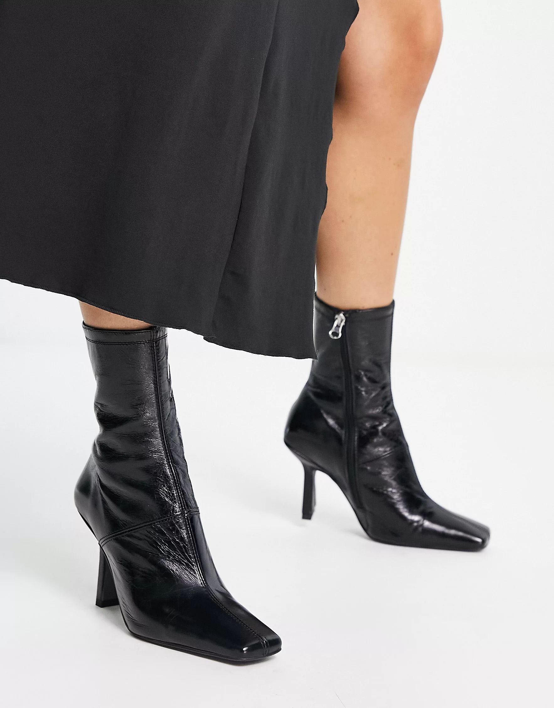 ASOS DESIGN Reign premium leather mid-heeled boots in black | ASOS (Global)