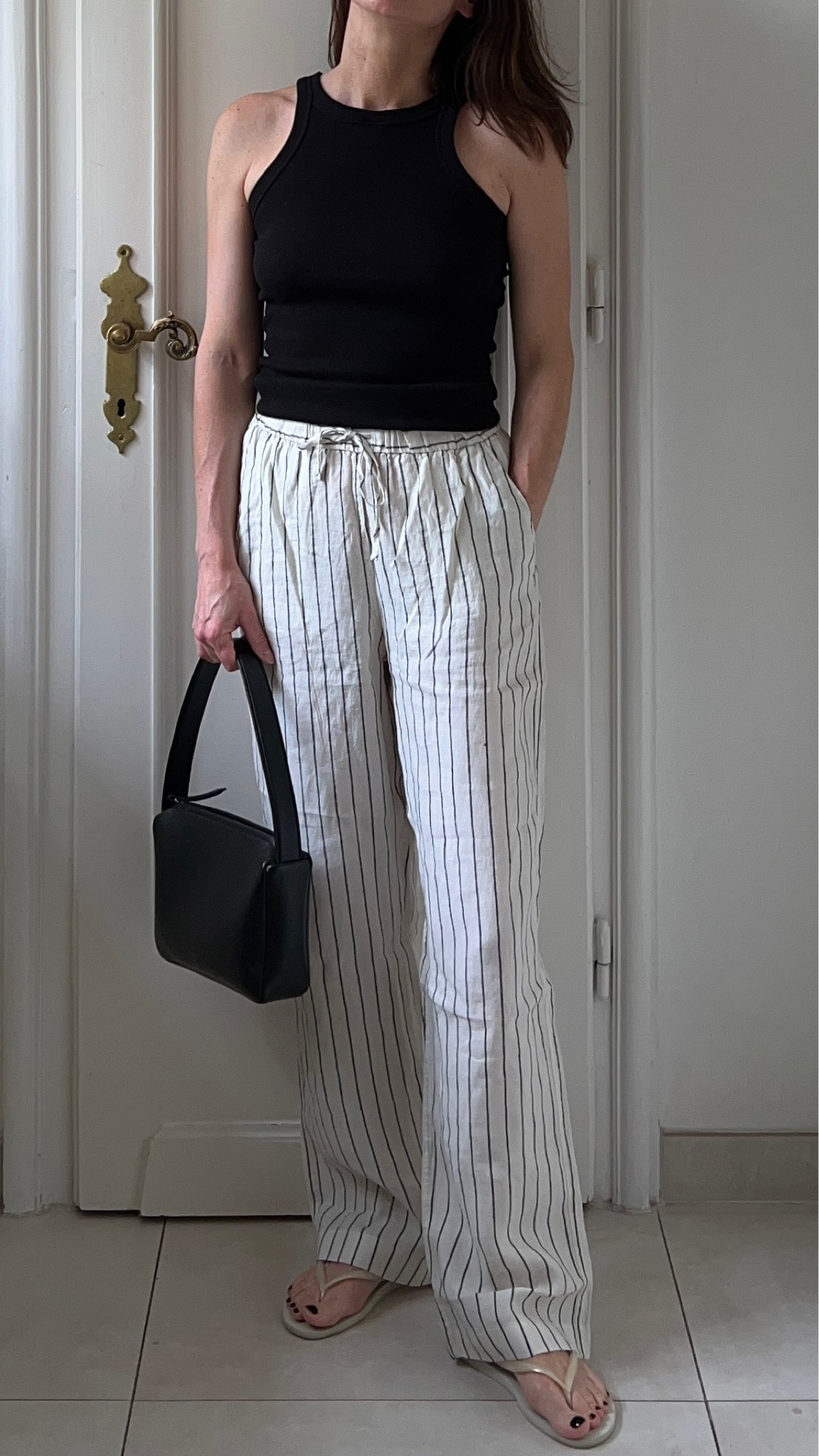 Casual summer look ☀️

Striped trousers, linen trousers, rib tank top, black top, white flip flops, minimal bag, shoulder bag, hand bag, Havaianas, Arket, h&m, ootd, capsule wardrobe, summer ootd, summer look, luxury bag, everyday look, Arket, hm, havaianas, Frenzlauer#LTKFind 

#LTKeurope #LTKSeasonal