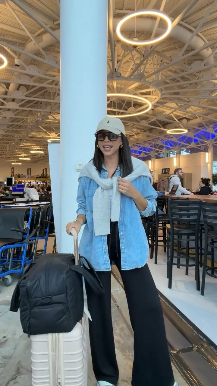 Comfy and chic airport outfit ✈️ These pants are so comfortable, lightweight and buttery soft! Paired with the softest denim shirt they make for a super cute and practical travel outfit! Use code NENAXSPANX for 15% off the pants - Wearing size S tall pants, S denim shirt (7 yrs pctr ths bleu), size S white tanks and size M sweater (sized up for an oversized fit) 

errands outfit, loungewear, denim shirt jacket, denim jacket, Spanx pants, Spanx code, mom outfit, postpartum outfit, work from home outfit, travel outfits, closet staples, wardrobe staples