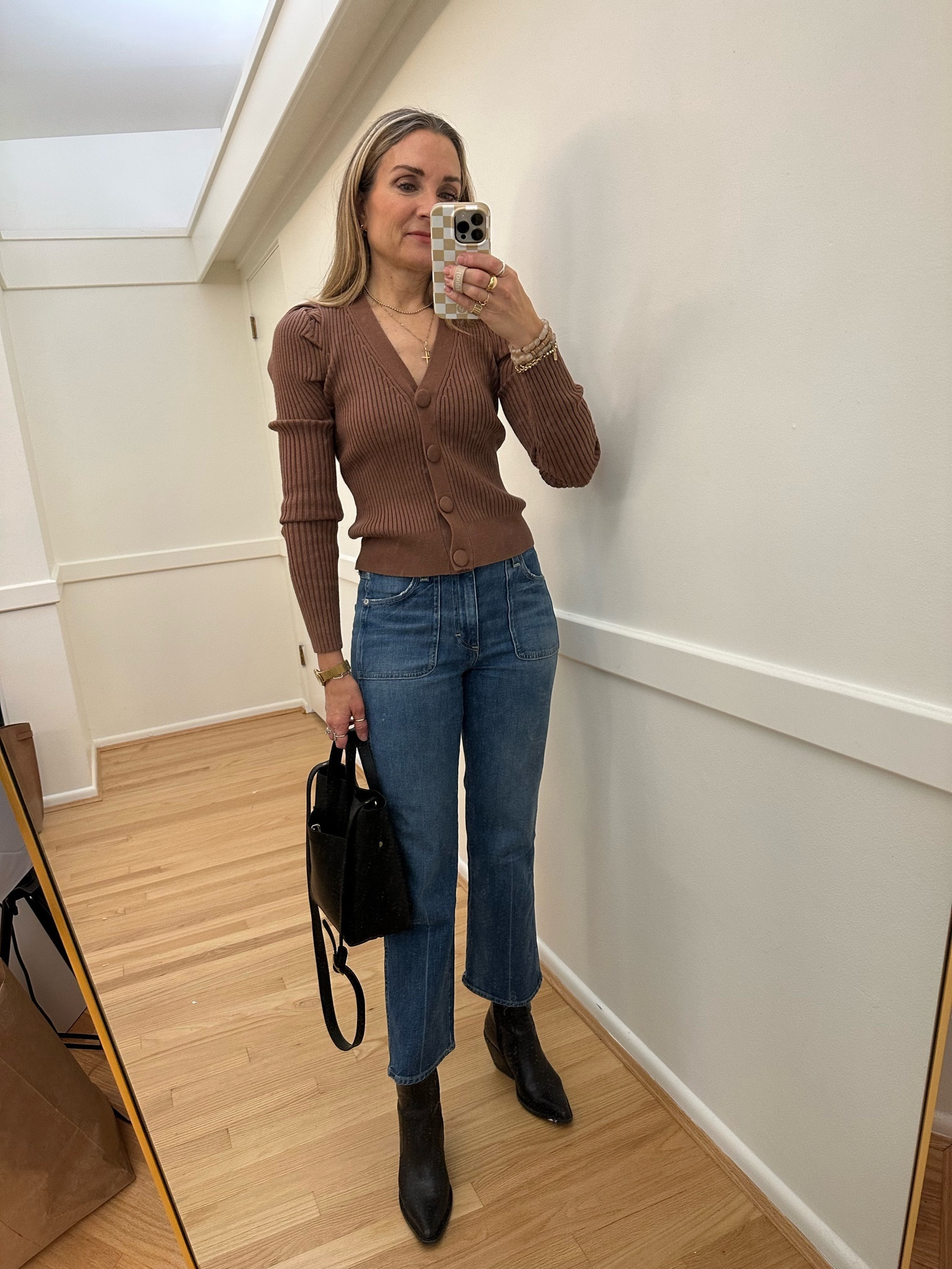 Winter outfit! Brown puff sleeve cardigan is such a great buy! Soft rib knit and fits tts.  My favorite western style black boots and crossbody leather tote bag! Kohl’s, dolce vita, Amo, Portland leather 

#LTKworkwear #LTKfindsunder50 #LTKstyletip