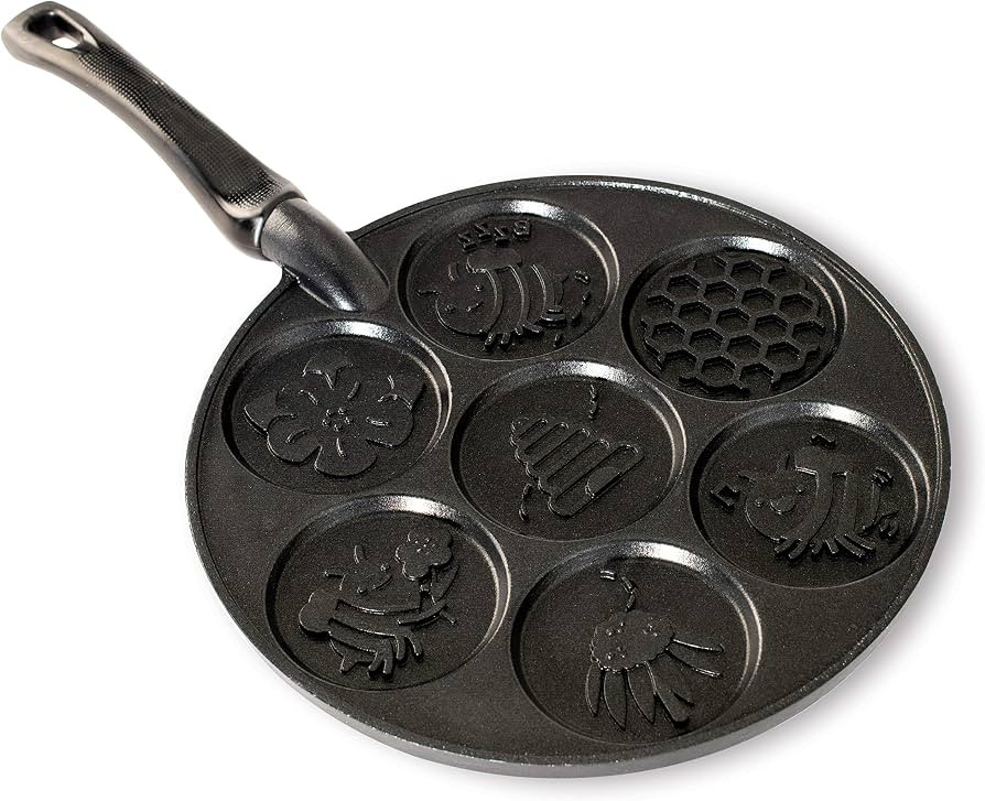 Nordic Ware 1915 Honey Bee Pancake Pan, Seven 3 Inch Cavities, Black | Amazon (US)