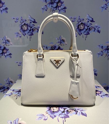 Fell in love with Prada again at Harrods! Such amazing displays and beautiful colors! 

#LTKeurope #LTKitbag #LTKU