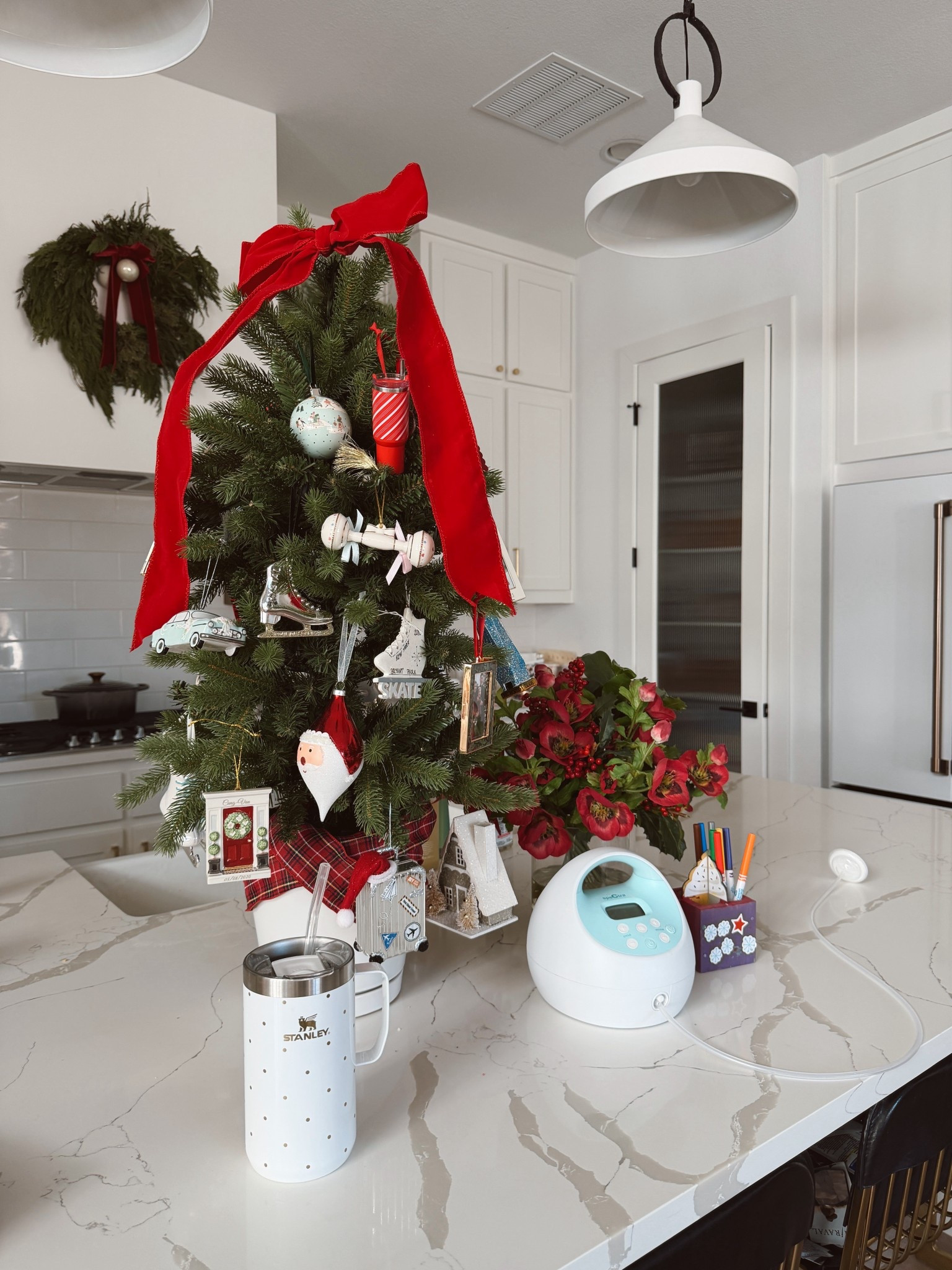 Holiday decor in the kitchen! Mini Christmas tree, Stanley, my spectra pump, and more 

#LTKHoliday #LTKmomlife #LTKHome