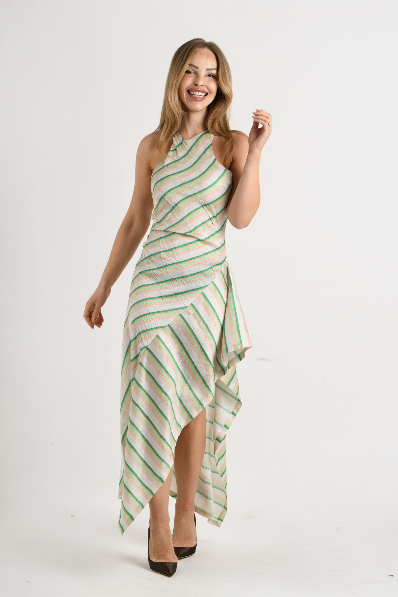 Bias stripes and a handkerchief hem feel so fresh. This green and cream halter dress moves beautifully and is perfect for garden parties and long lunches. Similar styles linked x 

 