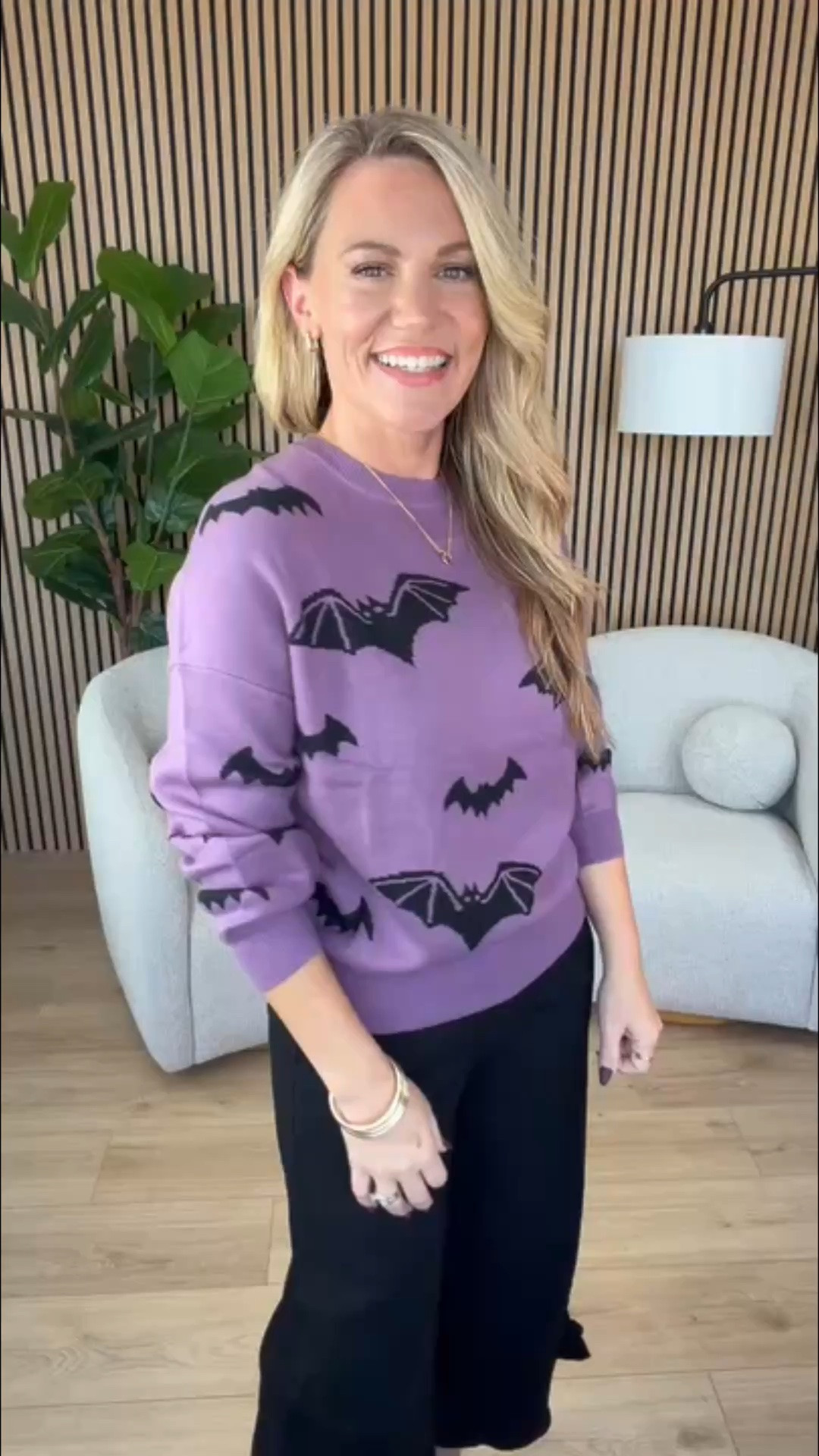 A Halloween sweater I’d actually wear. The purple keeps it fun, the black bats keep it from feeling too sweet, and I like it best with simple black pants and heels so the sweater gets to be the whole point.

Sizing:
Sweater: Standard
Pants: Size 2
Heels: Size 7.5, true to size

halloween sweater, bat sweater, purple sweater, halloween outfit, black pants outfit, festive fall style, women’s fall fashion, halloween fashion, seasonal sweater, AudrieDollins
