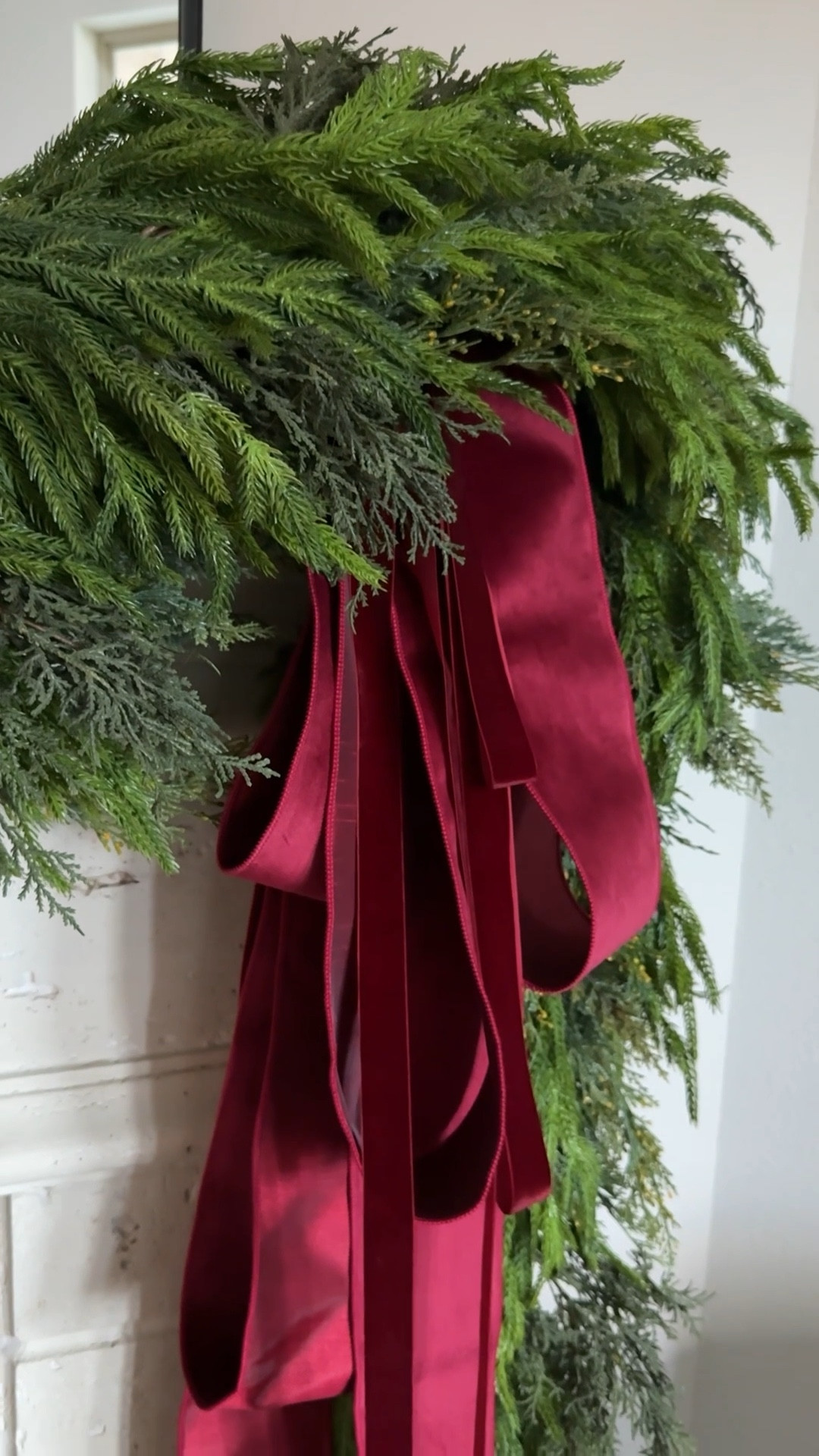Velvet burgundy ribbon for our Christmas garland on the fireplace 🌲 



#LTKHoliday #LTKHome