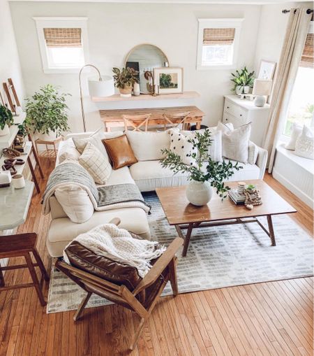 Boho living room, cream sectional, farmhouse coffee table, mid century furniture boho accessories 

#LTKhome