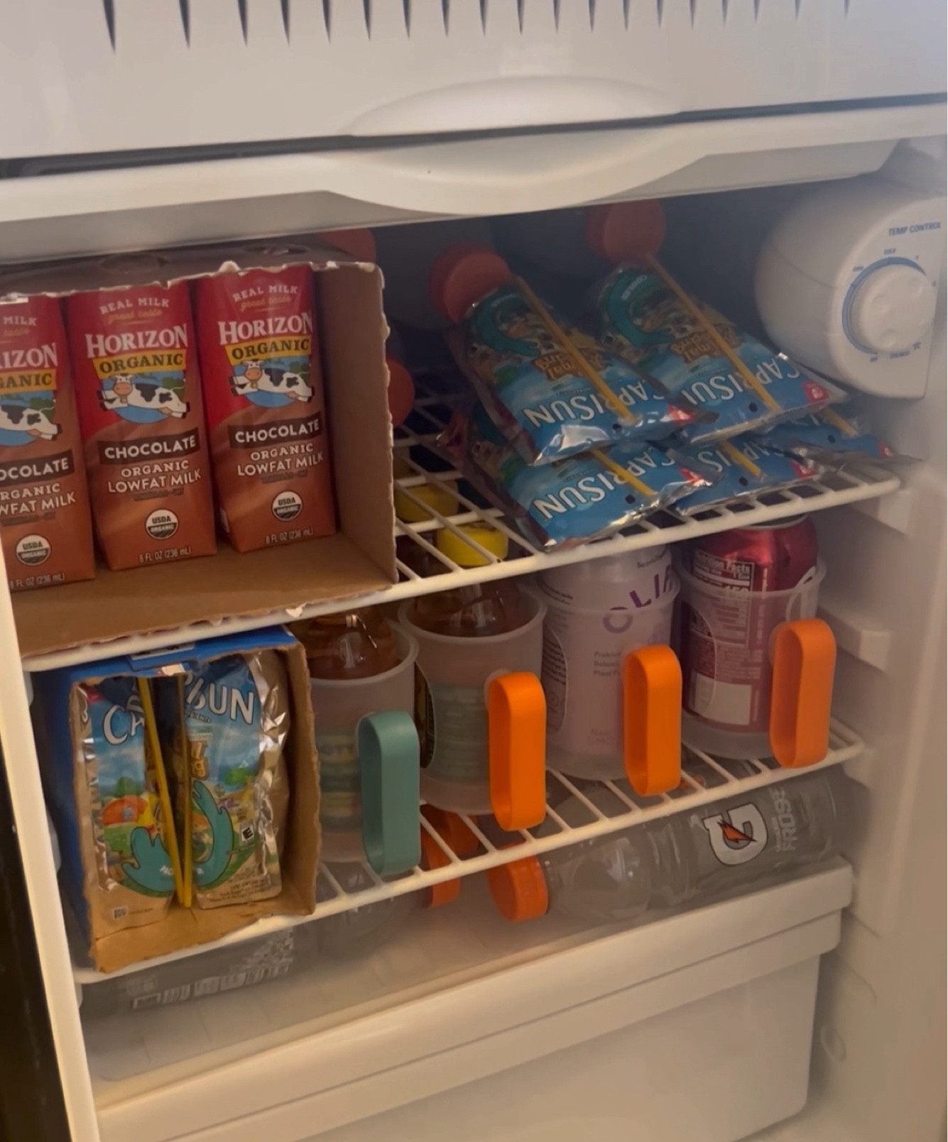 Soda can organization for the mini fridge. There are so many options when it comes to soda/drink dispensers so I linked a handful of different options depending on your style & what you prefer! They are all great options!! Just make sure to check your space & get measurements so you know whatever option you pick will fit your space! 

#minifridge #sodacanorganizer #drinkdispenser #drinkorganizer #minifridgeorganizer 

#LTKfindsunder50 #LTKhome