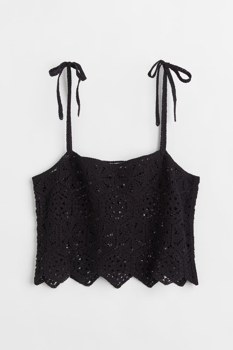 Conscious choice  Crochet-look crop top in lace with narrow, tie-top shoulder straps.SizeThe mode... | H&M (US)