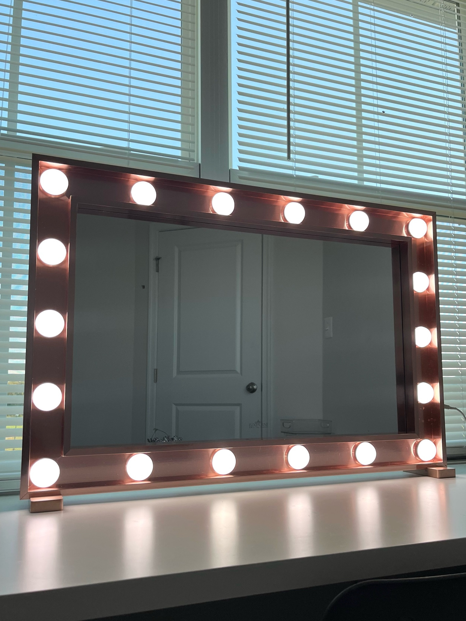Rose gold vanity makeup mirror with lights and changeable settings! 

#LTKbeauty #LTKHoliday #LTKGiftGuide