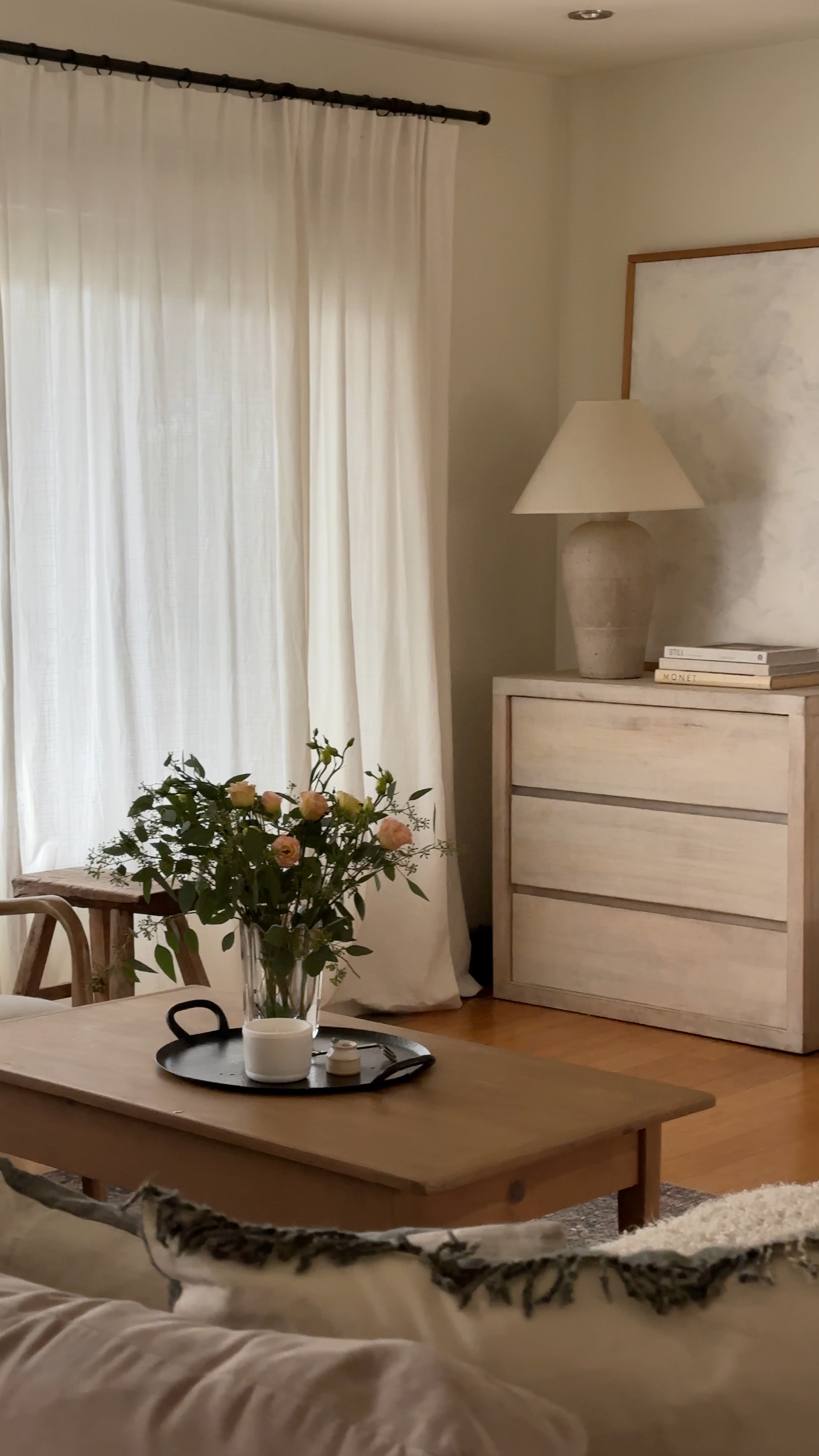 Neutral living room design, 3 drawer dresser, black curtain rod, coffee table decor 

#LTKVideo #LTKhome