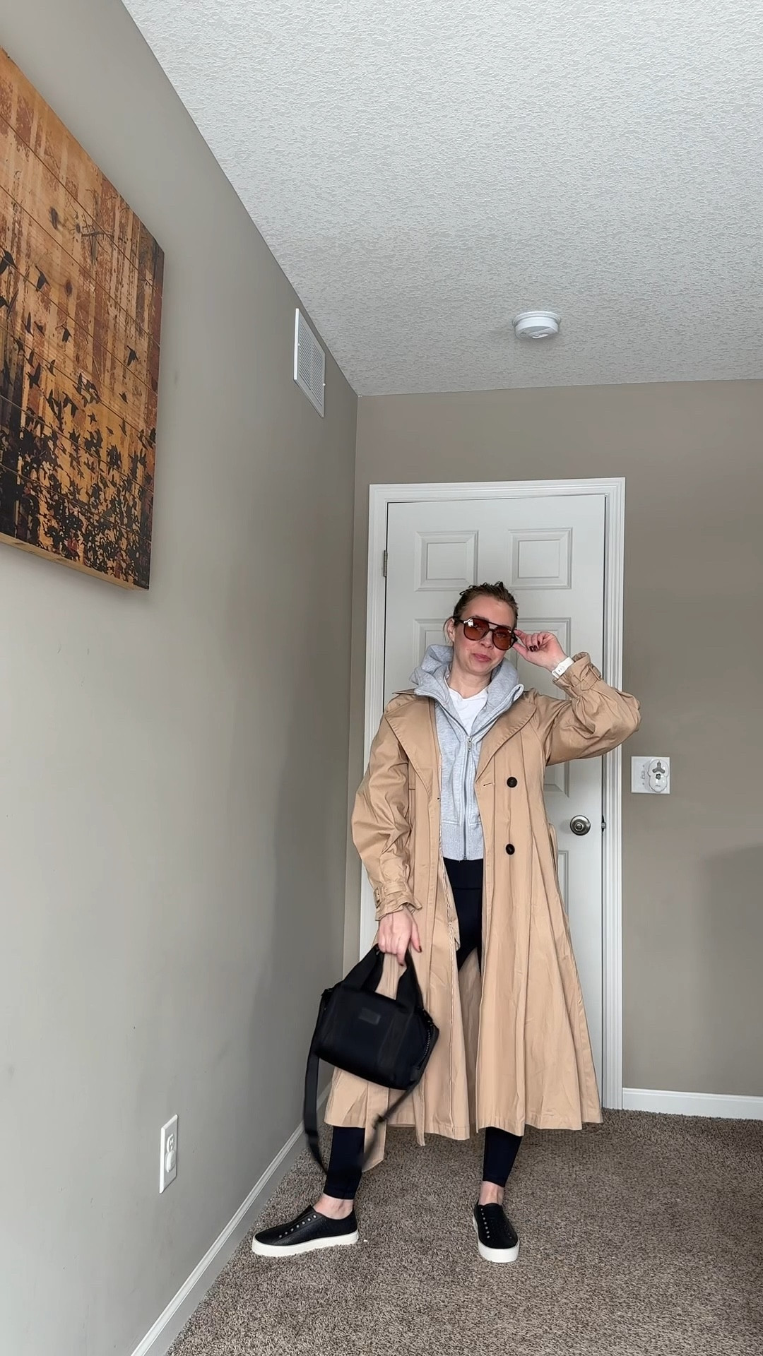 Athleisure but make it intentional.

Leggings, hoodie, and sneakers instantly feel more pulled together once you add a trench. This has been my go-to transitional outfit for cold mornings and warmer afternoons.

Comfort level stays high. Outfit still looks planned.

Everything linked including trench coat, hoodie, leggings, and everyday slip-ons.

athleisure outfit, mom on the go outfit, spring layering outfit, casual everyday style, comfy but presentable outfit, travel day outfit

#LTKmomlife #LTKSpringSale #LTKootd
