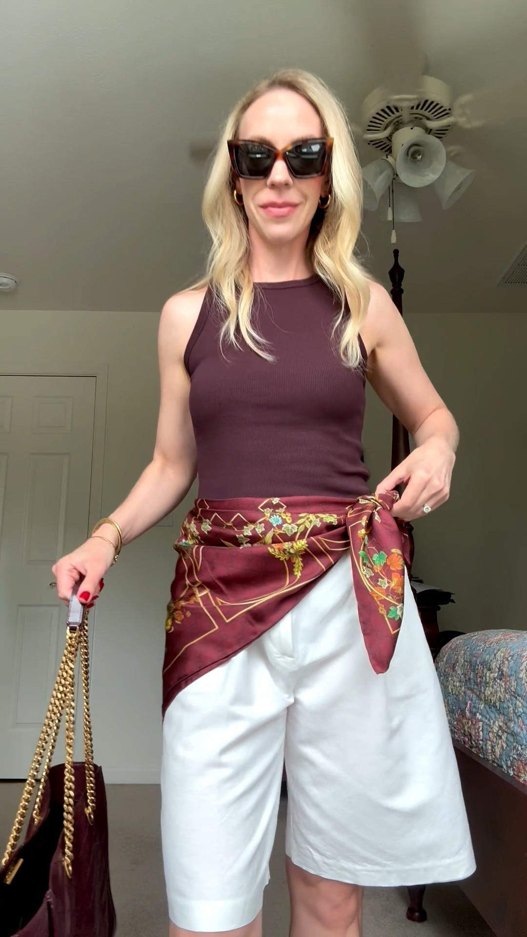 Casual chic outfit for late summer with burgundy tank top, silk scarf tied at the waist, bermuda shorts

#LTKSaleAlert #LTKSeasonal #LTKOver40