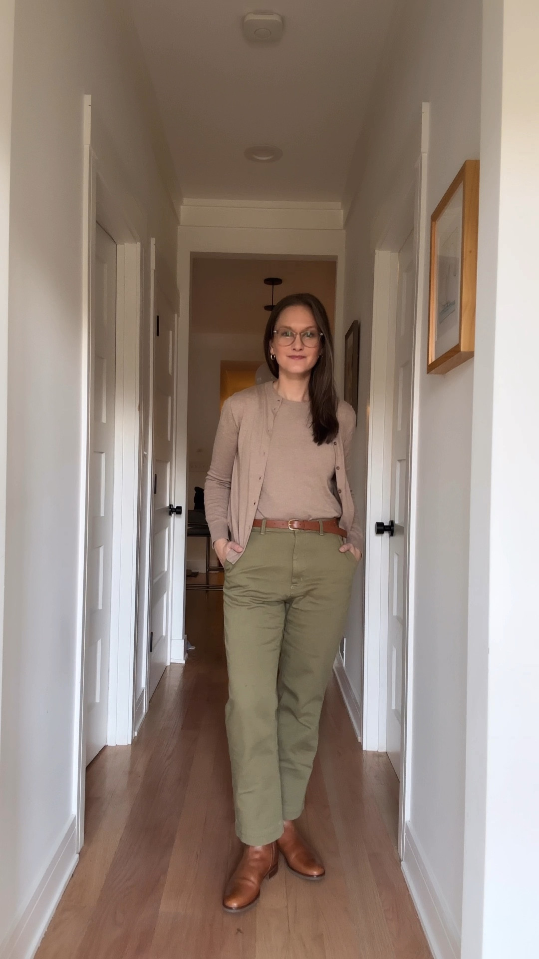 Early January had her easing into the new year, balancing resolutions with reality. She stepped into the daycare/co-working space in olive stretch cotton twill pants—her husband’s thoughtful Christmas gift—that hit just above her new brown knee-high boots, a perfect pick from her mom. A matching tan shell and cardigan completed the look, polished but effortless, with her trusty gold hoops giving a familiar touch of glam. When her husband called the ensemble “a little bit western,” she grinned and countered, “but city western?”—as if she’d just coined a new fashion genre. Later, she swapped the boots for sneakers and the cardigan for a tank to sneak in a workout on her Peloton, already envisioning a year where sticking to routines could be just as stylish.

#LTKStyleTip #LTKWatchNow #LTKWorkwear