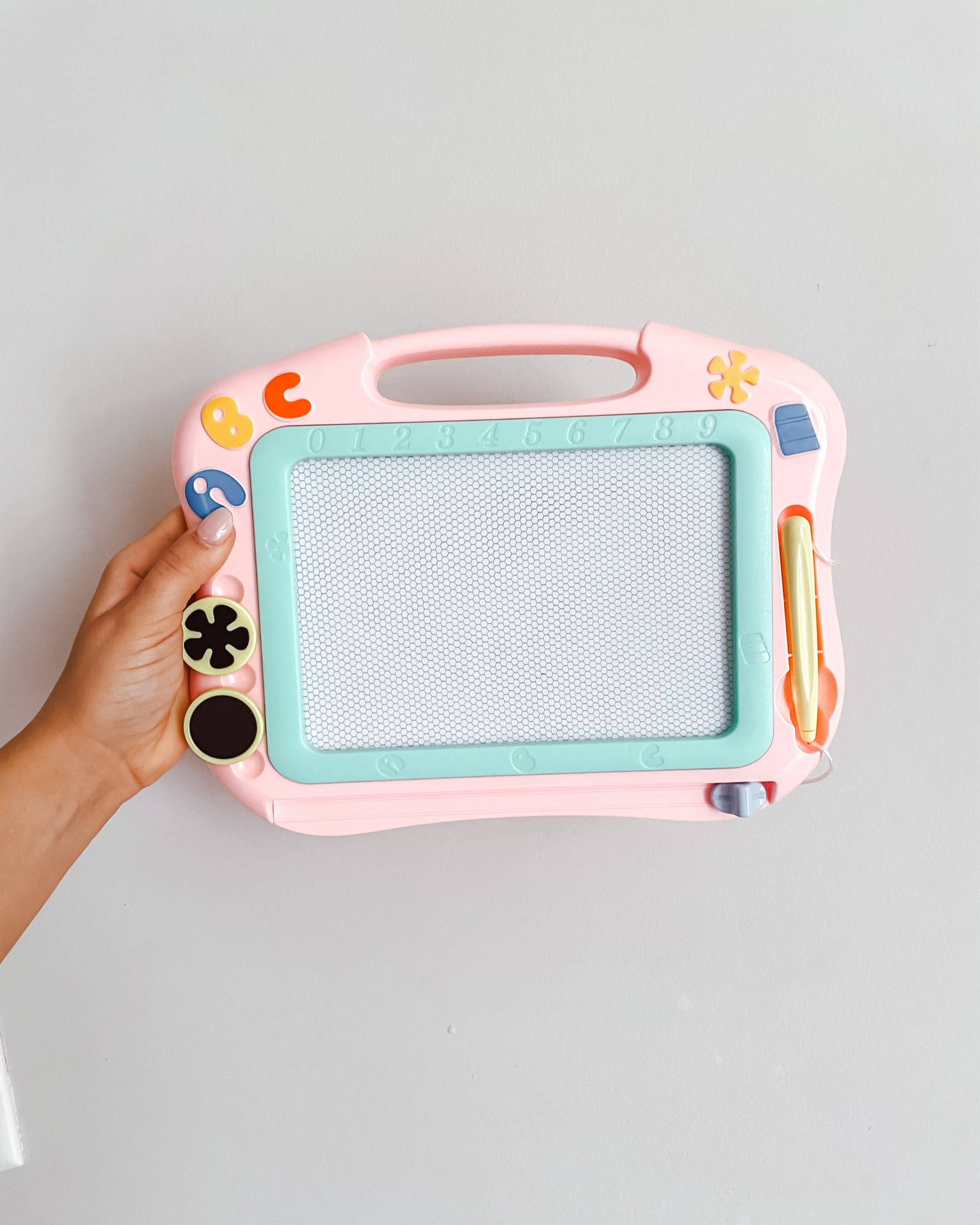 Toddler fun!✨

We are preparing to go away to the beach + we will have a long car ride, so finding things for our toddler to keep herself busy has been a struggle. But then I found this magnetic doodle board!!

Very easy to use + toddler friendly!
•4 color zones
•stylus attached to board 
•2 magnetic stamps in cute shapes
•bottom slider to erase board

#LTKFind #LTKkids #LTKBacktoSchool