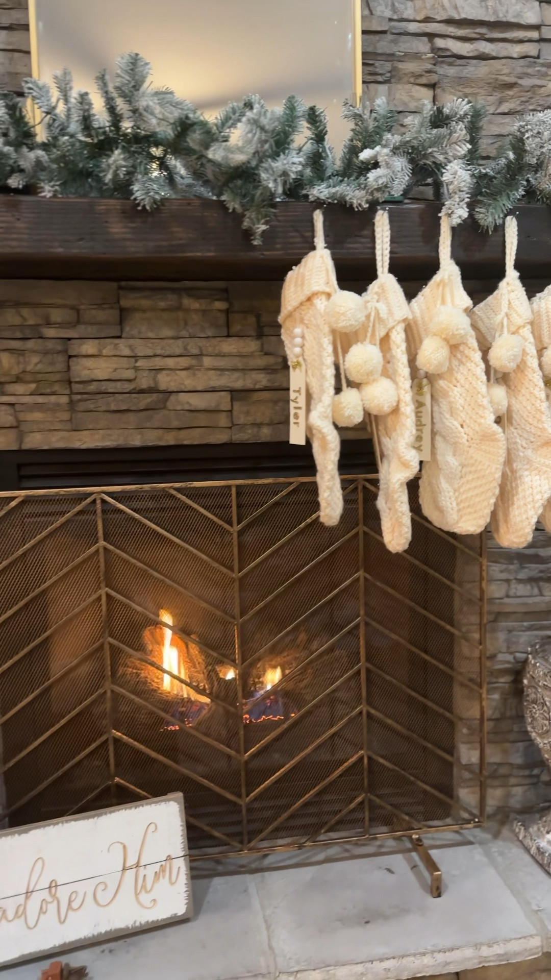 My Christmas home decor in our living room! Flocked Christmas tree, Christmas decor, artificial tree & prelit garland, mantle decor, personalized stockings, Christmas gift ideas, holiday decorations, garland, chunky knit stocking, gold fireplace screen cover, wooden name tags, Etsy finds, amazon finds, holiday finds, gift guide

#LTKHoliday #LTKhome #LTKSeasonal