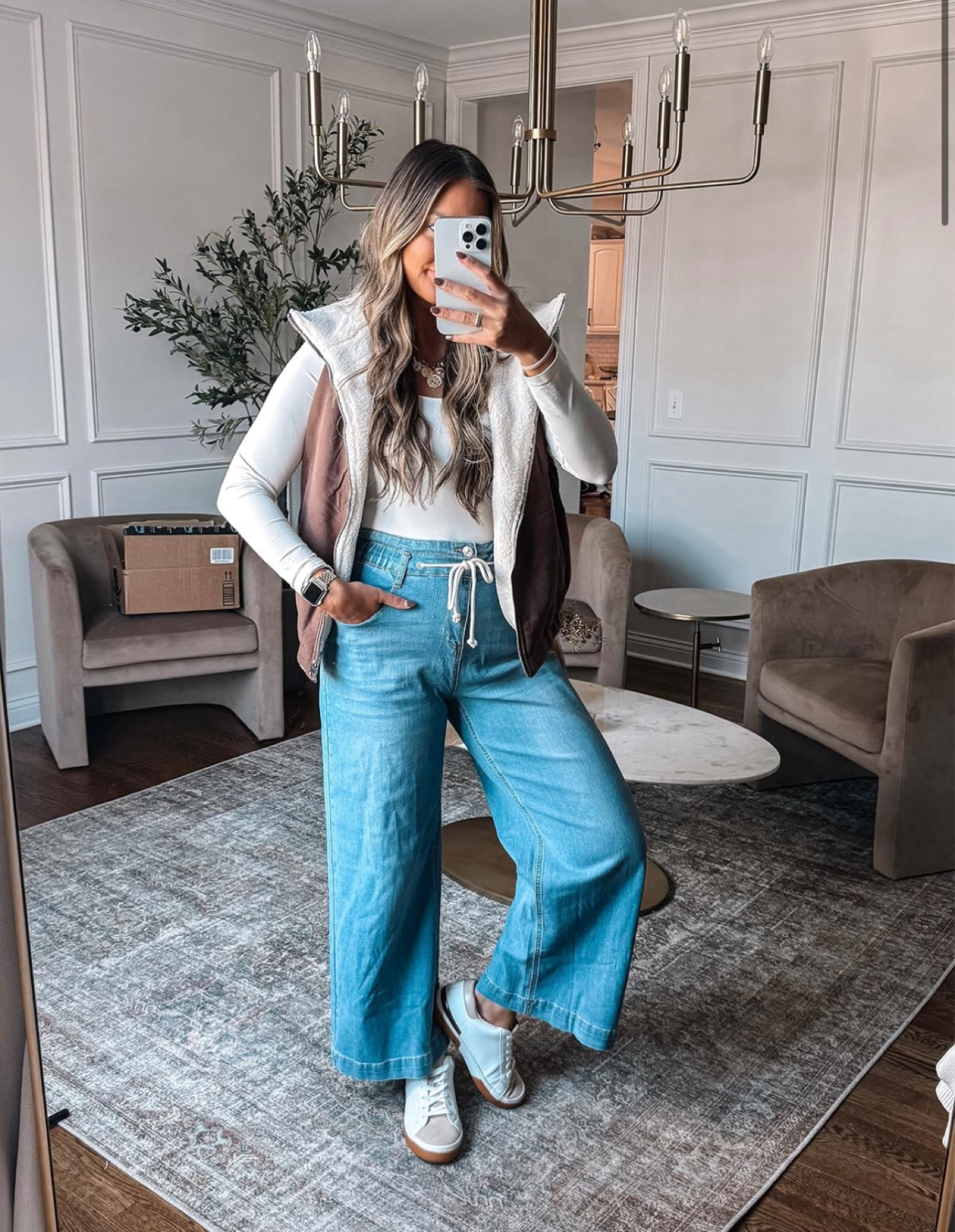 A postpartum friendly look I've been loving - fleece vest paired with wide leg jeans and casual sneakers. 

#LTKFindsUnder50 #LTKStyleTip #LTKSeasonal