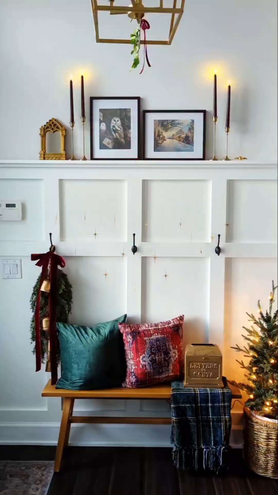 Harry Potter Christmas. Hogwarts Christmas. Hedwig art from Etsy. Hogwarts train art from Etsy. 9 and 3/4 station. Mirror of Erised. Golden Snitch decor. DIY swag with ribbon and bells. Hanging stars with fish wire. Mini Christmas tree in a basket. Magical Christmas decor. Christmas pillow covers. Christmas plaid blanket. Gold taper candle holders with LED burgundy taper candles. Faux mistletoe hanging on my chandelier. #Christmas #LTKfind

#LTKHoliday #LTKSeasonal #LTKHome