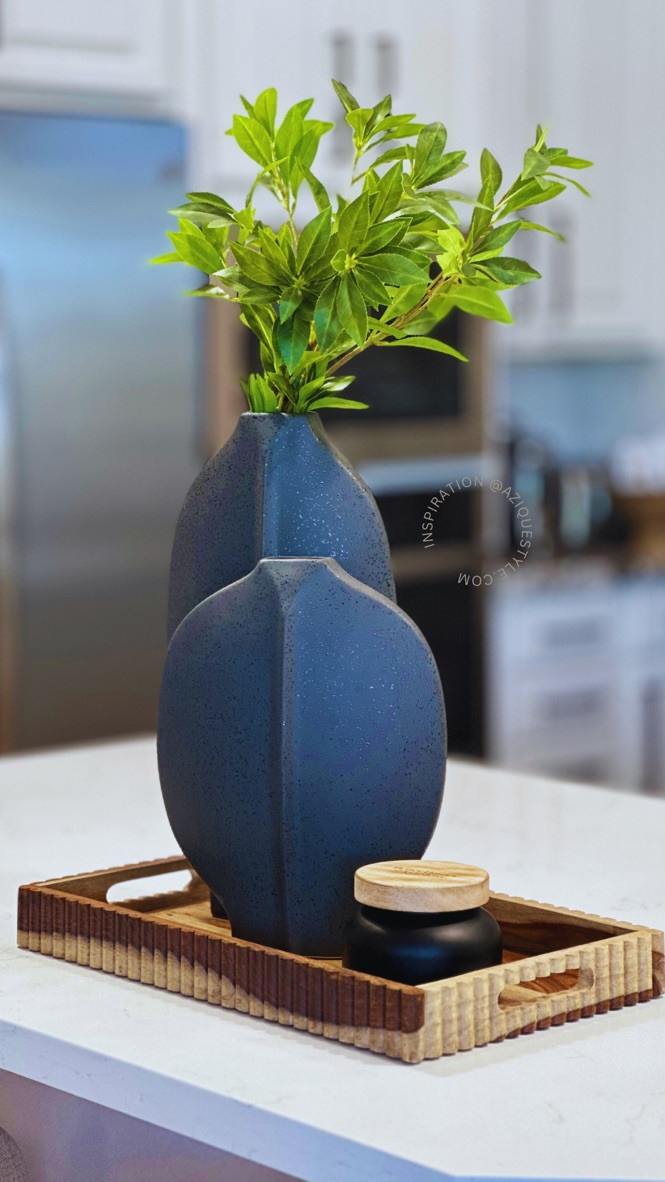 Simple modern and chic vases set and my favorite faux greenery. The best ever find! #aziquestyle #homedecor #modernvases #fauxgreenery

#LTKHome #LTKSeasonal