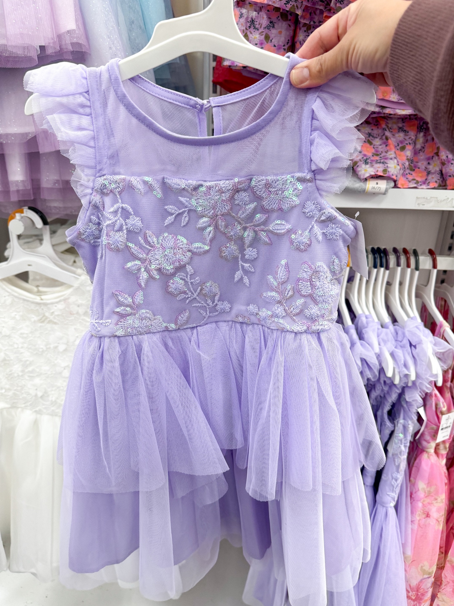 from the target app:

This beautiful Zenzi Girls' dress is absolutely stunning. This unique style features an embroidered sequin bodice, an illusion neckline, flutter sleeves, and a beautiful two-tone mesh fairy hem skirt. Made with soft, comfortable, machine washable fabric. She will dazzle in this dress and will not want to take it off!

#LTKkids #LTKstyletip #LTKfindsunder50