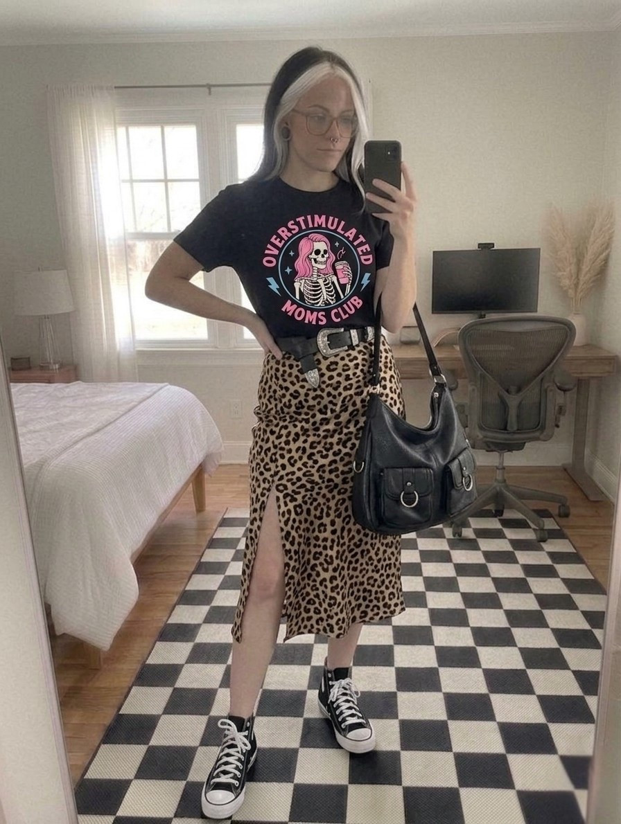 Mixing prints and textures is my love language. This leopard midi skirt paired with a graphic tee is the perfect transition outfit for errands, coffee runs, or school drop-off. The Western belt adds that extra "it-girl" touch, while the platform Chucks keep it practical for all-day wear.

#LTKootd #LTKSeasonal #LTKMidsize