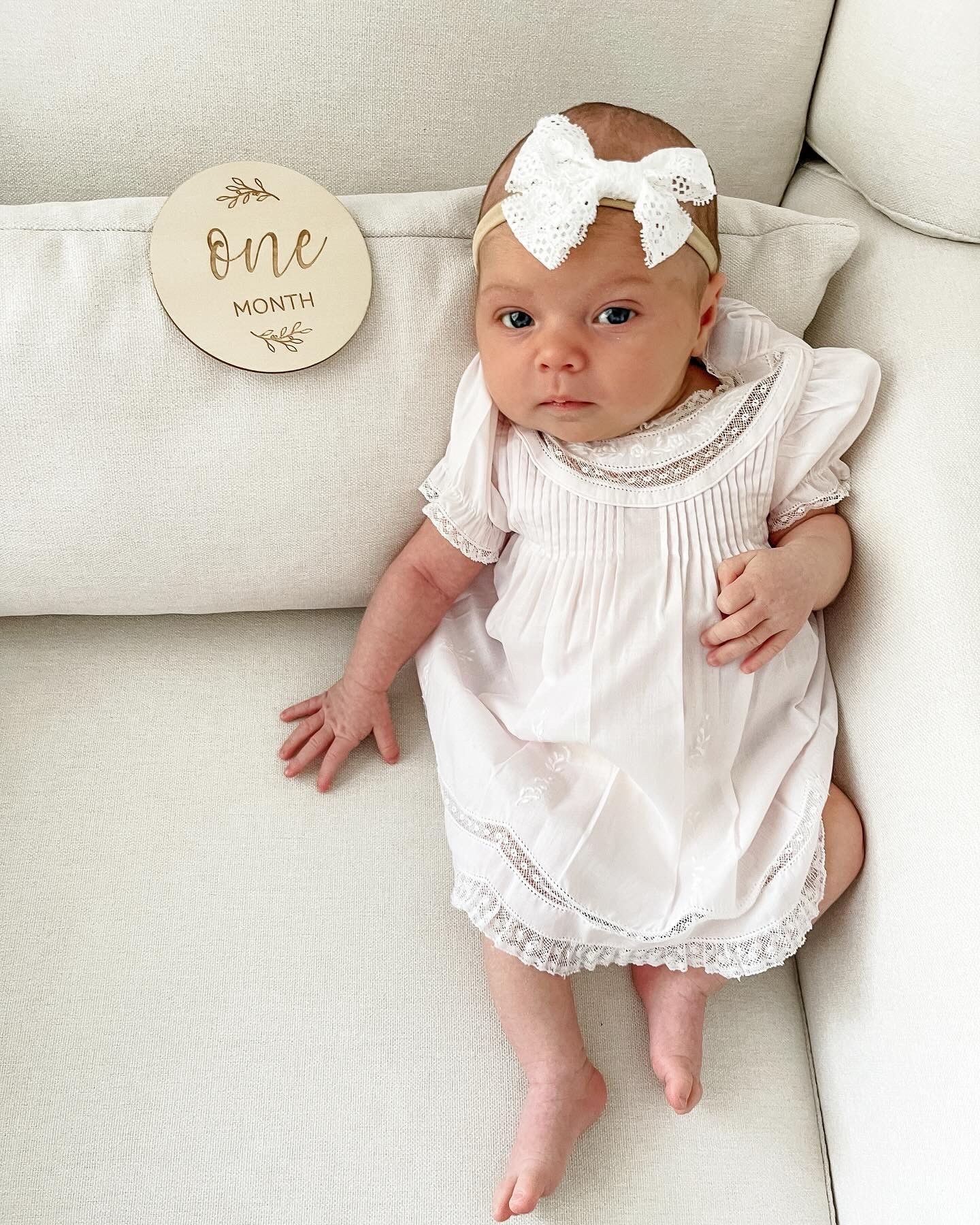 First month pictures for Claire! So sweet!  

Babyletto Kiwi Glider Recliner with Electronic Control and USB
Pearhead Wooden Pregnancy Milestone Photo Props
Vintage smocked dress newborn 

#LTKkids #LTKbaby #LTKsalealert