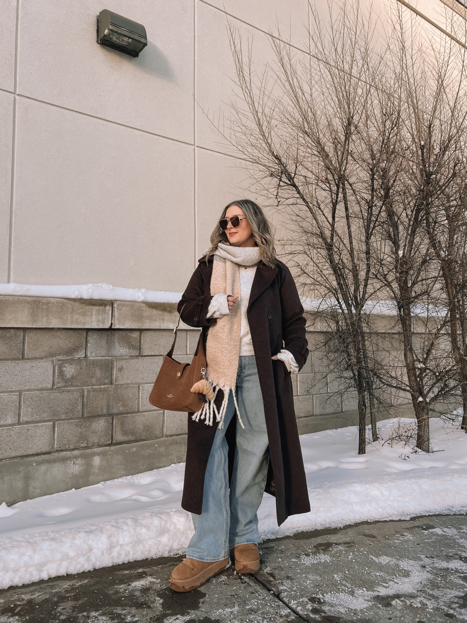 Casual winter outfit! I’m wearing my usual size L in my Abercrombie long chocolate brown wool blend coat. These are my all time fave jeans from Abercrombie, wearing 32 for a looser fit. My Ugg style platform boots are Amazon and such good quality, I’m a 9.5-10 and wear a 10. I’ve been using this suede Coach shoulder bag on repeat and it’s perfect for everyday. Linked similar scarf & sweatshirt 


#LTKwinter #LTKmidsize #LTKsale