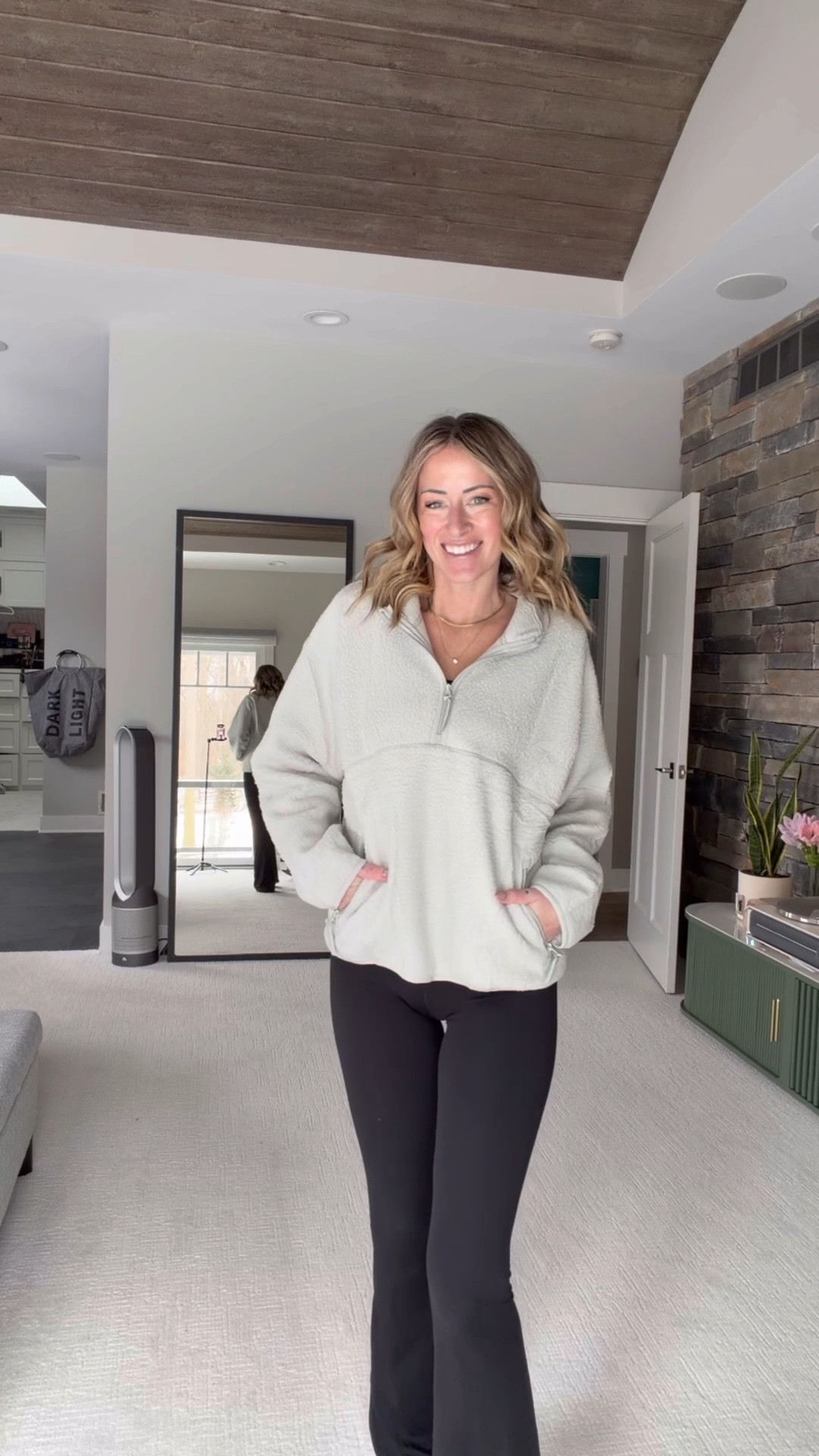 Soccer mom outfit ideas 
Grey fleece pullover paired with flared leggings and Nike sneakers 
White Gucci bag 
Outfits for winter weather 

#LTKmomlife #LTKgrwm