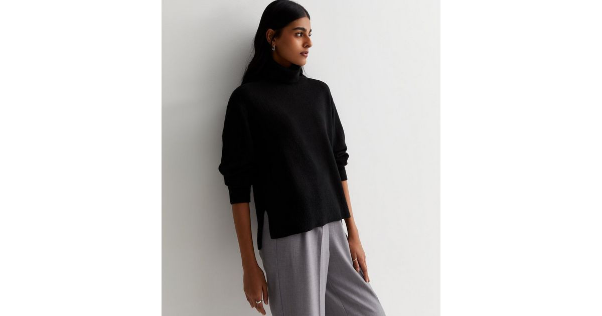 Black Knit Roll Neck Split Hem Jumper
						
						Add to Saved Items
						Remove from Saved Ite... | New Look (UK)