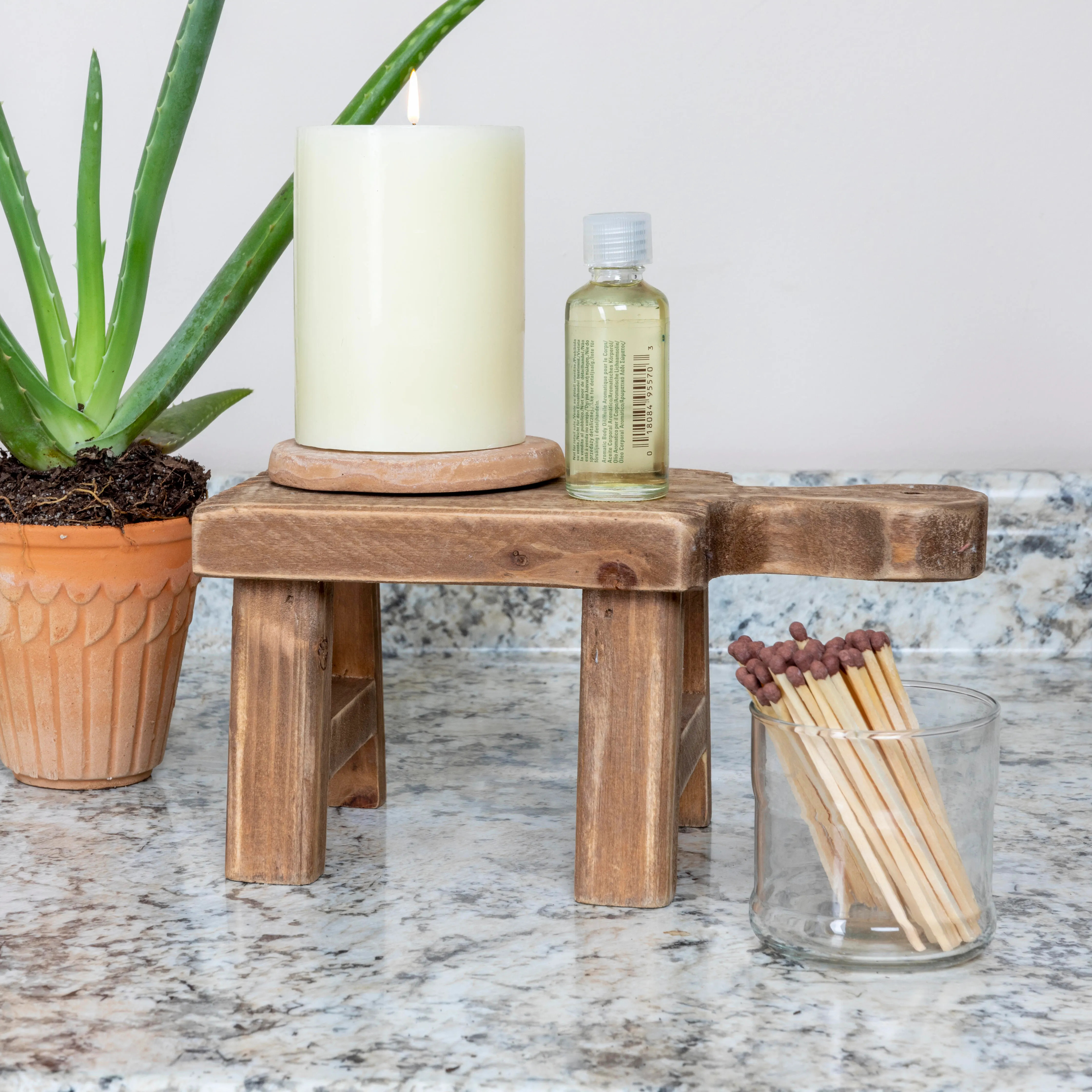 Storied Home Small Pedestal with Handle, Natural | Ashley