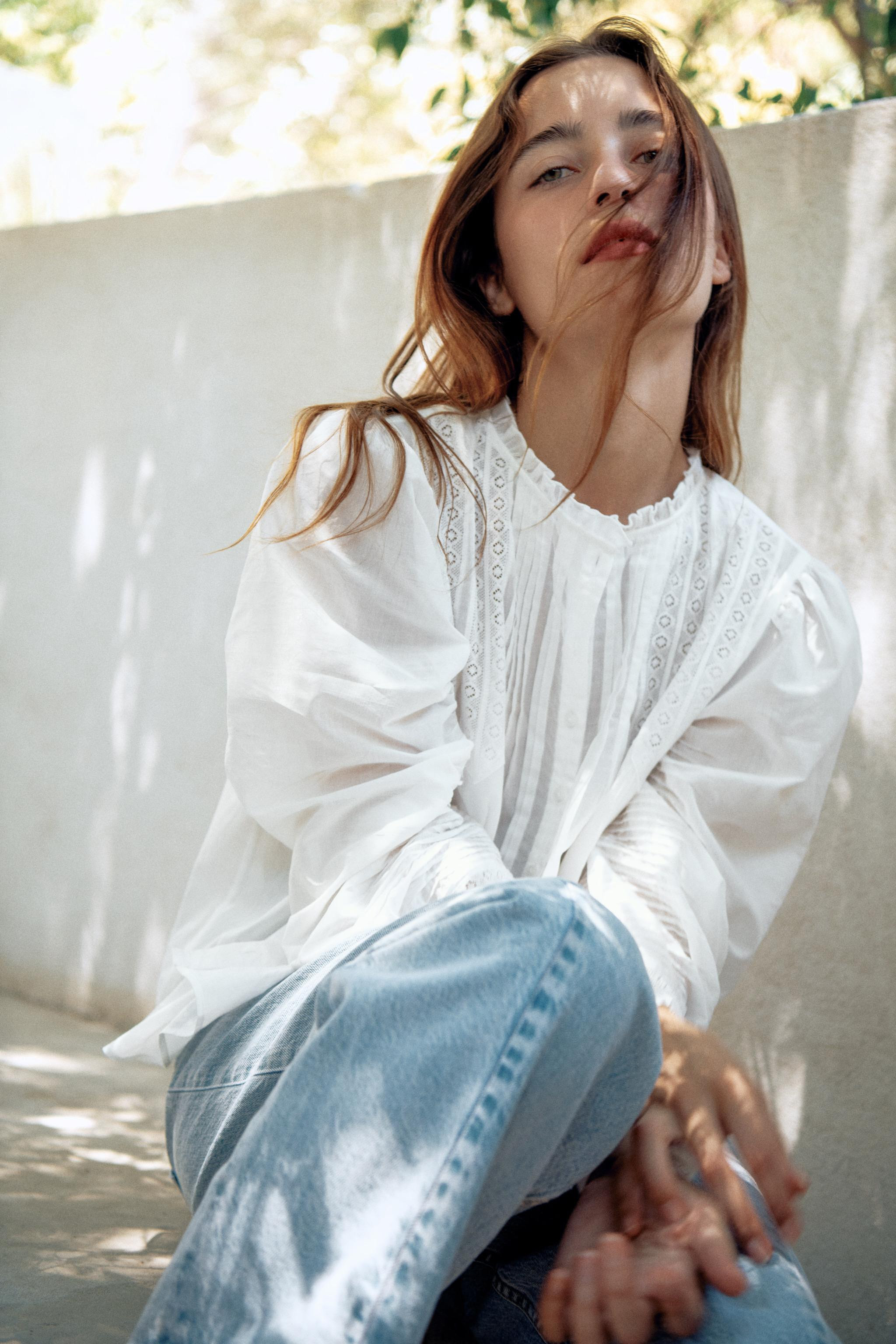 ZARA WOMAN COLLECTIONShirt made from cotton yarn. Round neck and long puff sleeves with cuffs. To... | Zara US