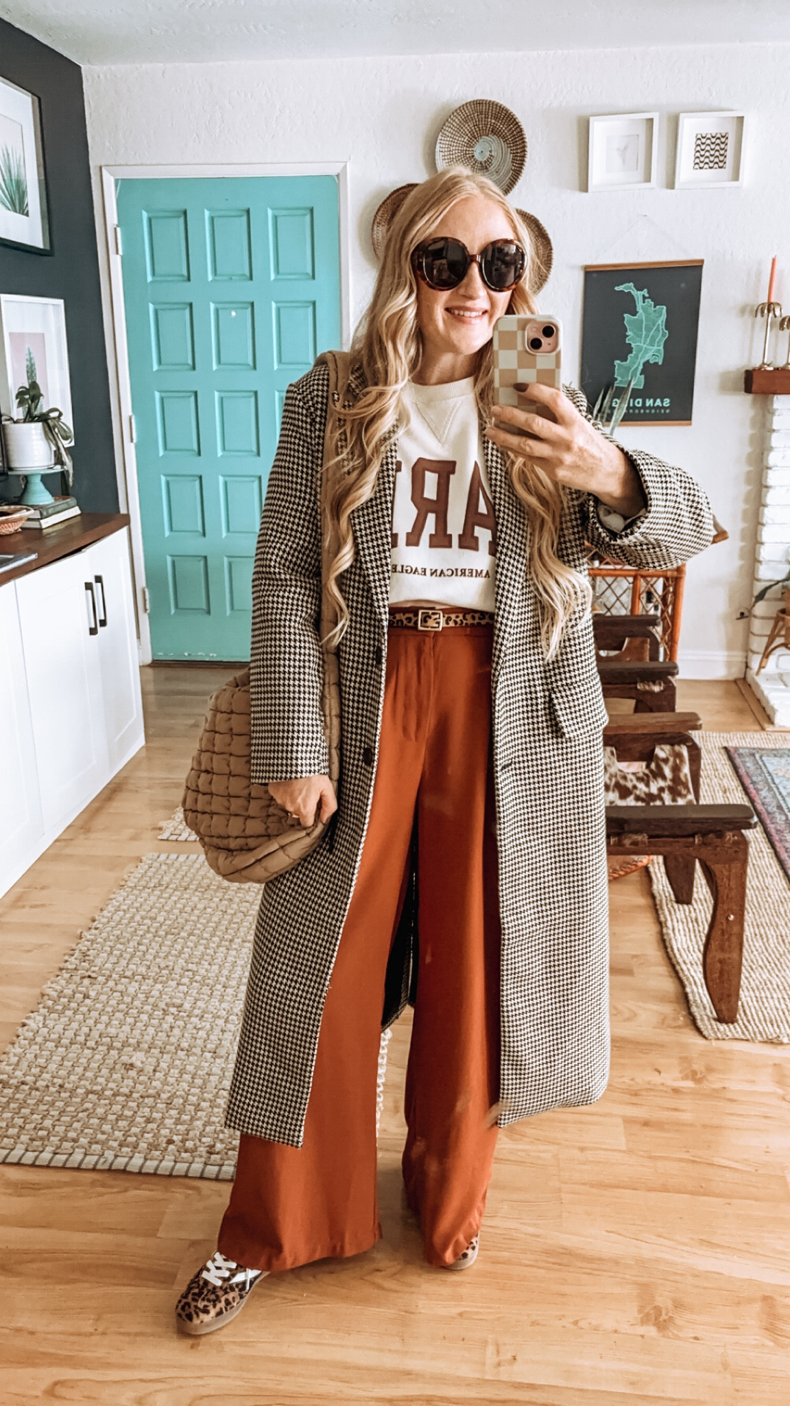 The cutest FALL COAT from Target! 🍂 Beautiful weight, comes in a bunch of colors, lined, pockets, etc - truly such a staple fall and winter jacket! Styled dressy here track pants, one of my favorite Paris sweatshirts, trousers and leopard sneakers! 

Sized down in jacket to S at 150 lbs and 5’7.” Could probably still fit thick sweaters underneath. Runs oversized! Wearing size L in trousers and sweatshirt. 

Fall coats, target fall finds, target finds, fall style, fall coats, winter coats, fall jacket haul, target fall style, houndstooth jacket, wool jacket, target seasonal, staple fall essentials, fall staples, fall wardrobe must haves, fall essentials, fall style, long coat, trench coat, wool jacket, church fit, classic fall outfit, classic style, chic outfit, old money style, old money aesthetic, trousers look, graphic sweatshirt, puffer bag, leopard sneakers

#LTKFindsUnder50 #LTKSeasonal #LTKStyleTip