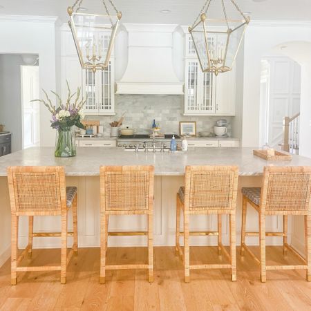 Classic coastal white kitchen | rattan counter stools | brass lantern pendants 

Serena & Lily | Visual Comfort

#LTKhome