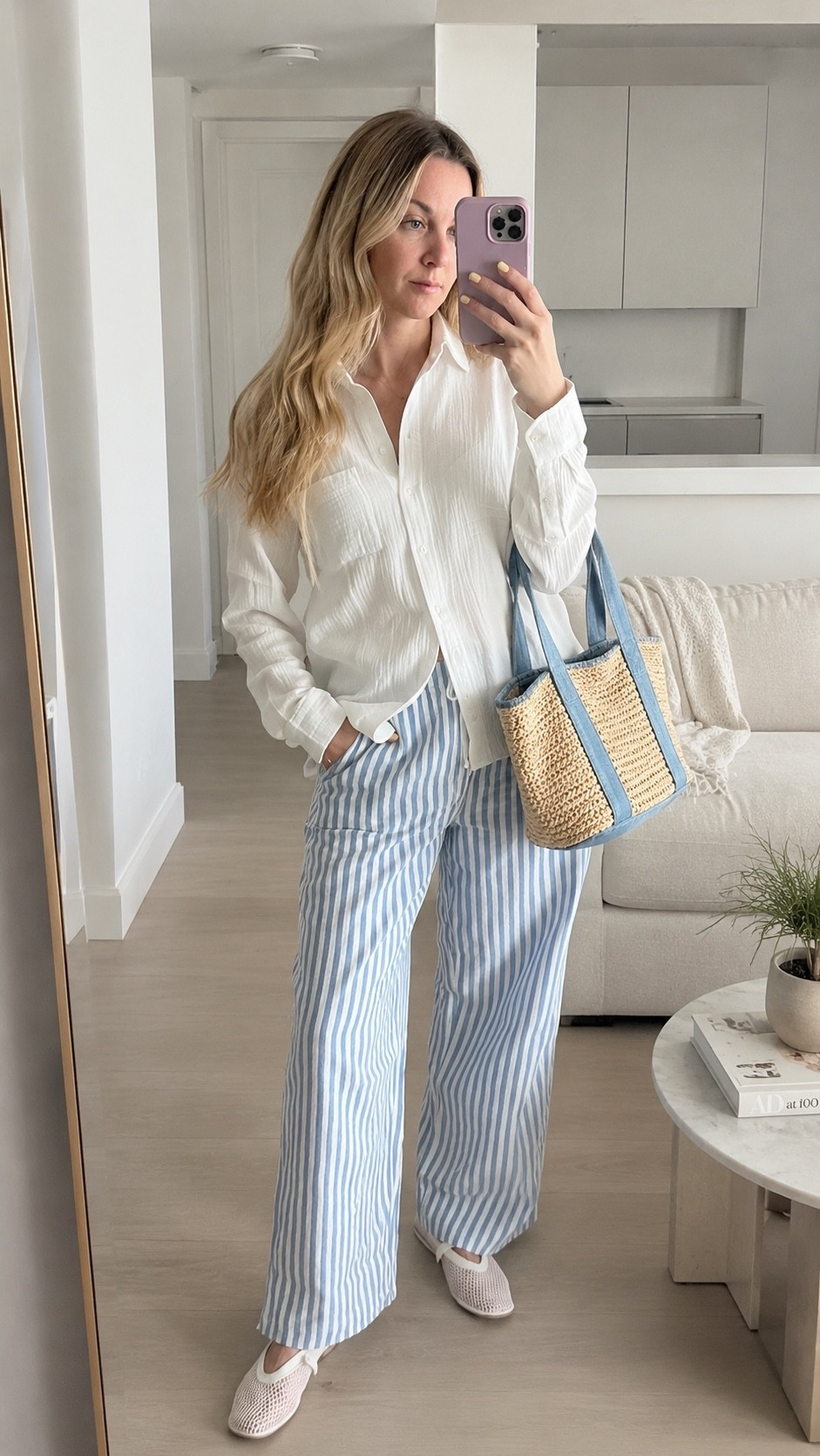 Coastal casual but make it polished ☁️🩵 This lightweight striped set from J.Crew is the perfect elevated spring-to-summer outfit — effortless, breathable, and chic for everyday wear, travel days, coffee runs, or slow mornings at home. Paired with soft neutrals, loose waves, and a woven straw tote for that clean girl coastal aesthetic. 

Loving relaxed linen-inspired pieces, blue and white stripes, oversized button downs, and easy wide-leg pants this season. 🤍

#Jcrew #LTKStyle #LTKSeasonal #CoastalStyle #PreppyStyle #SpringStyle #SummerStyle #BlueAndWhite #StripedPants #MinimalStyle #CoastalGranddaughter #NeutralStyle #CasualChic #EverydayStyle #ClassicStyle #CleanGirlAesthetic #LightSpringPalette #BeachyStyle #RelaxedLuxury #EffortlessStyle
