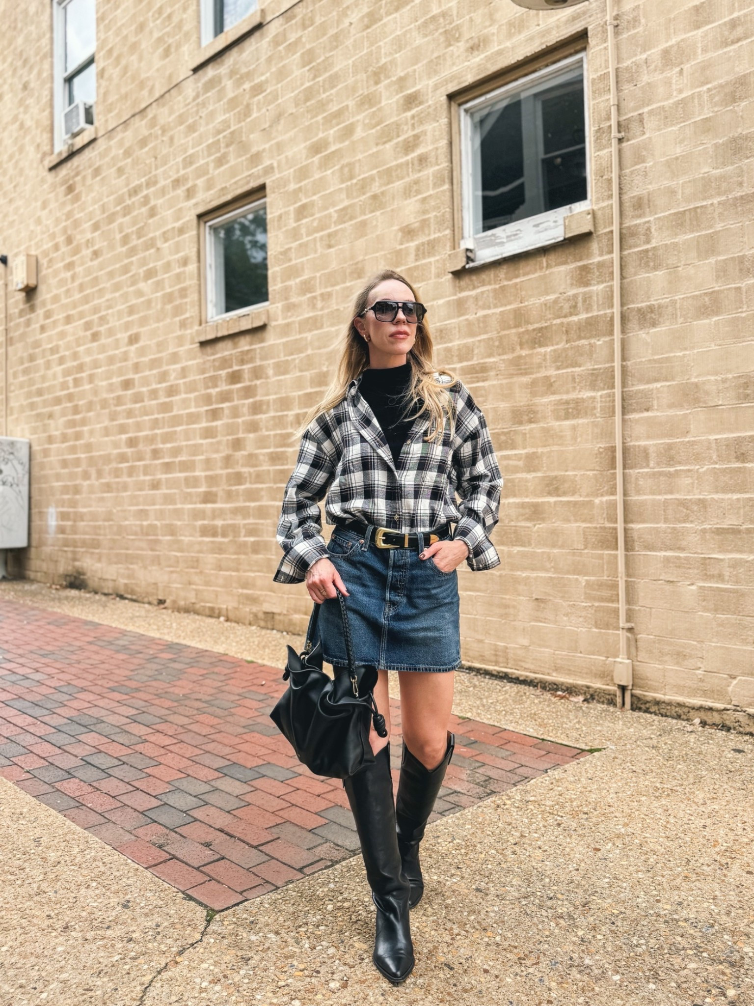 Western chic fall outfit with flannel shirt, denim mini skirt and black cowboy boots

#LTKSeasonal #LTKOver40 #LTKSaleAlert