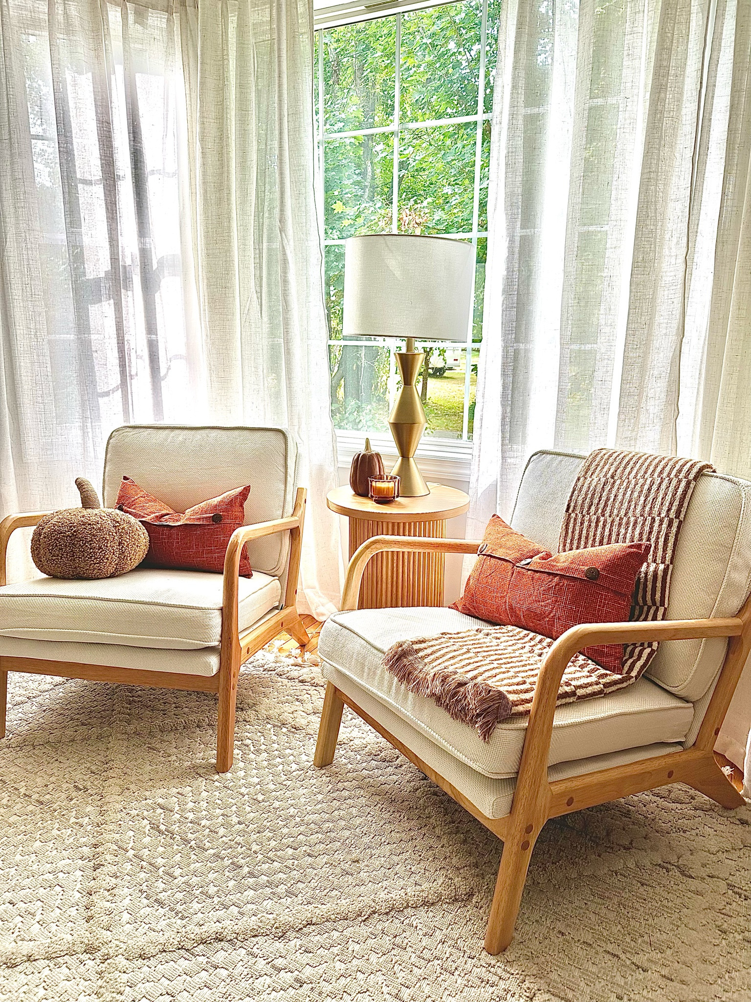 Updated my little seating area and added some fall decor 🎃 

#sittingarea #chairs #falldecor #midcenturymodern #homedecor

#LTKFallSale #LTKSeasonal #LTKHome