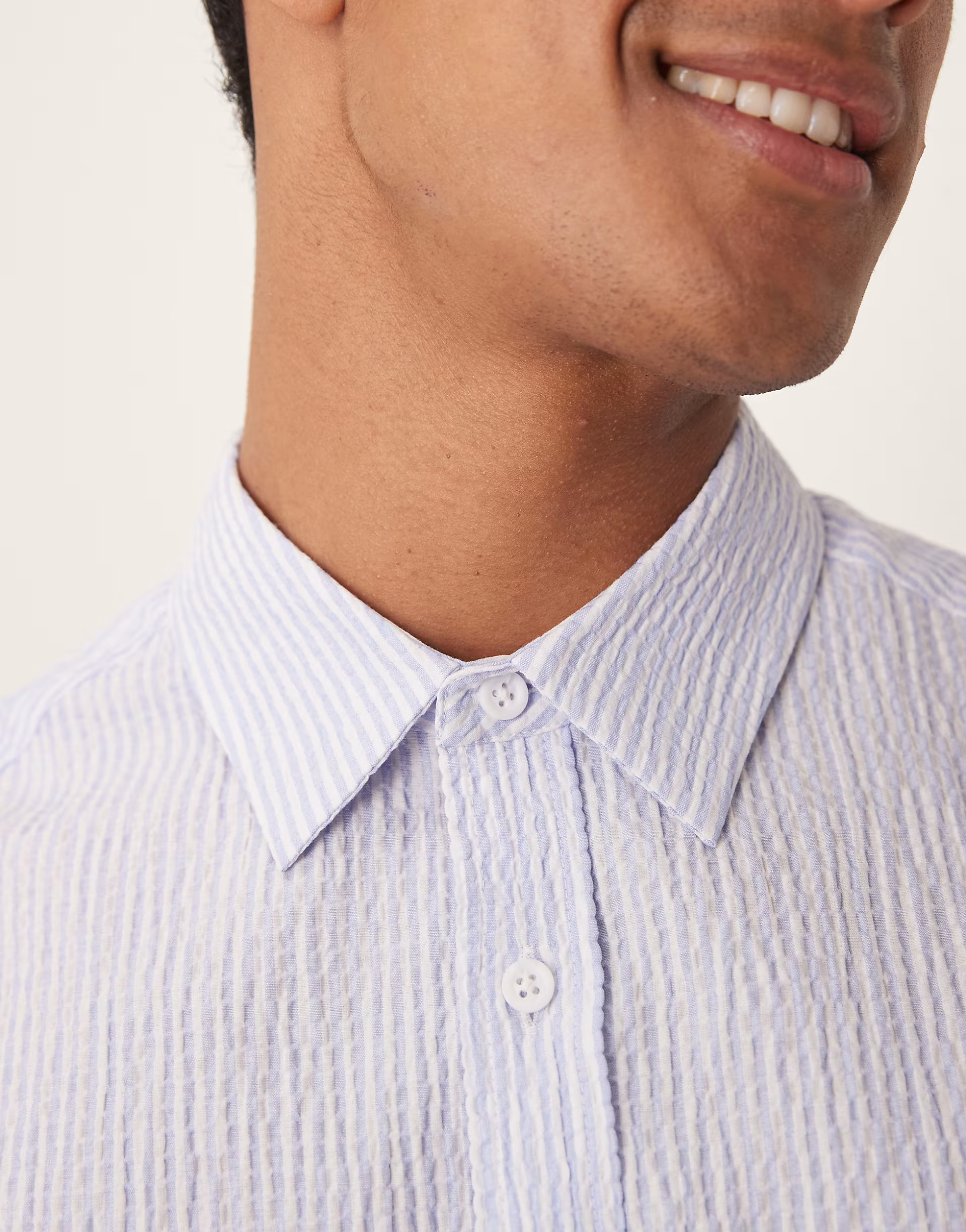 ASOS DESIGN textured seersucker regular shirt in blue and white stripe | ASOS | ASOS (Global)