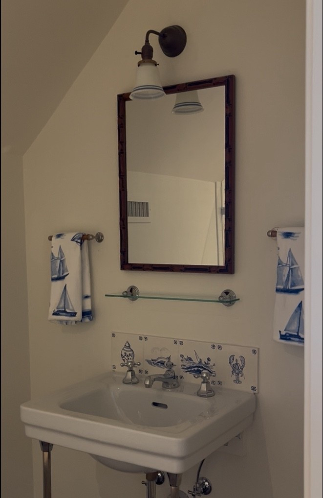 Get this classic nautical inspired blue and white bath look - bamboo towel bars, timeless glass shelf, blue and white boat towels..

#LTKSpringSale #LTKHome #LTKSaleAlert