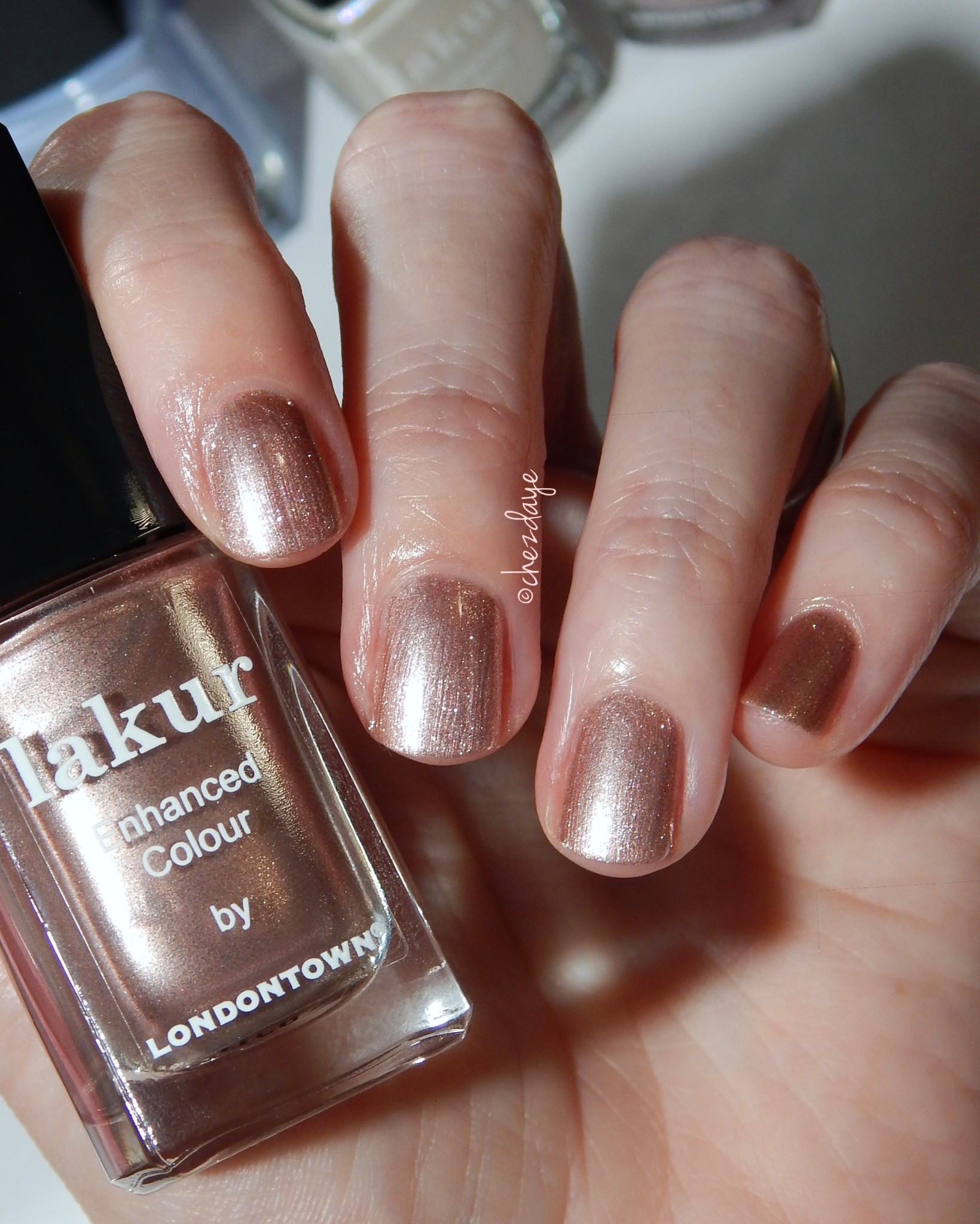This shade is describe sheer & shimmering mauve gold. I don’t find it particularly sheer, but it is all kinds of shimmery. ✨ 

• diy nails • nail polish • vacation outfits beach • spring nails • work outfits • spring dresses • date night outfits • diy nails • spring outfits 2026 • spring break • resort wear • summer nails • beach day • business casual workwear •


#LTKselfcare #LTKBeauty #LTKgrwm