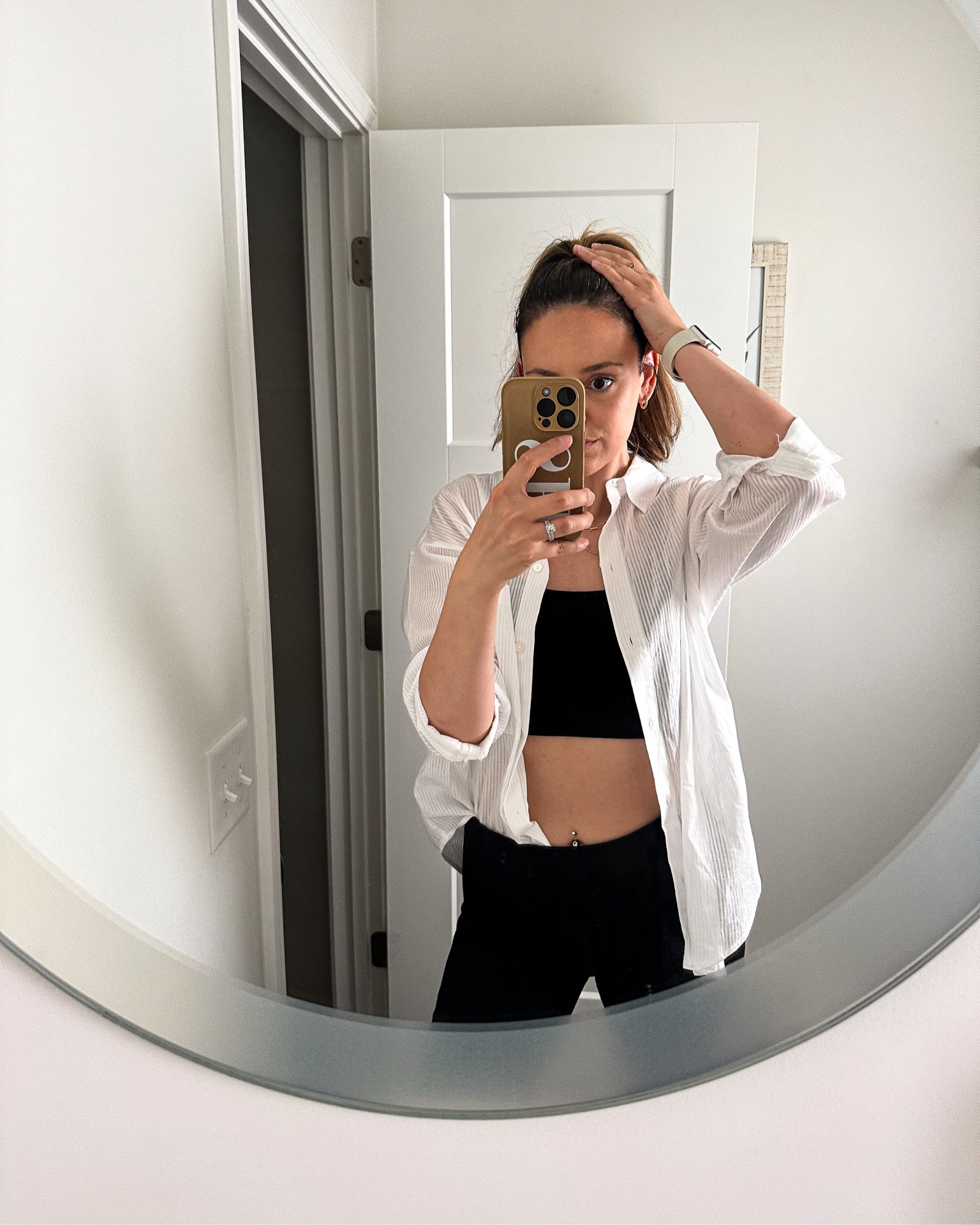 Causal outfit. Women’s outfit. Black biker shorts. Black sports bra. White button up blouse. Women’s active wear. Womens workout fit. Comfy outfit. 

#LTKstyletip #LTKFind #LTKfit