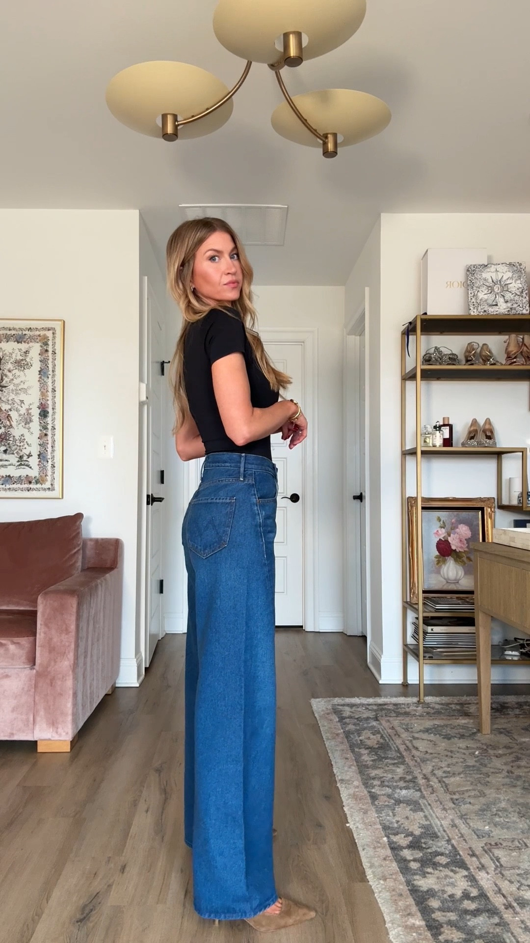 These jeans are 20% off today with code Leanne20. Run BIG, I rec sizing down 1 size. Wearing 24. This wash is ‘Yes Chef’ but available in 4 washes (all linked) 

Black bodysuit: wearing S
Suede kitten heels : run TTS 
#anthrosale #ltksale 

#LTKgrwm #LTKootd #LTKSpringSale