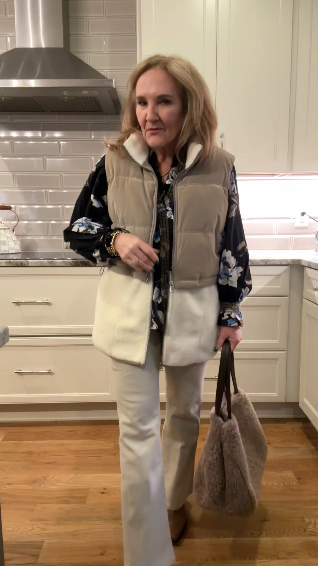 2-1 vest wearing size large on sale and  use my 20% off code NANETTEXSPANX 

Jeans, order your larger size 
Blouse I’m wearing a medium and it has plenty of room available in size a small, medium and large  use my code NANETTE15 for 15% off one Avara  order
Allie+Bess 20% off code NANETTE20
Eby bra code NANETTE20
Winter outfit spanx vest two tone light colored jeans, floral blouse, Sherpa bag for bag

#LTKSaleAlert #LTKOver40 #LTKSeasonal