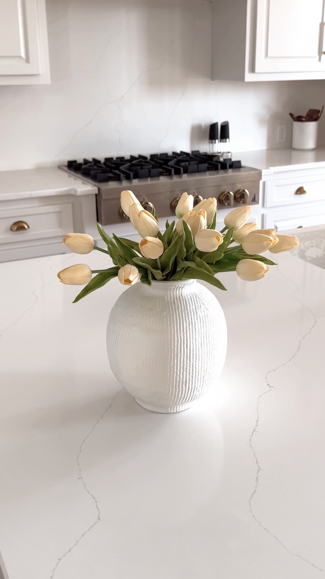 Realistic and Affordable Faux Tulips From Amazon
I never thought I’d be a faux flower fan… until I met these tulips. These Amazon faux tulips are incredibly lifelike. I’m talking soft, real-touch petals and vibrant but natural colors that make guests do a double take.
I ordered the creamy white set and instantly fell in love. I popped them in a ceramic vase on my kitchen counter and they instantly brightened the space. The best part? No water, no wilting, no maintenance.
They’re perfect for spring, but honestly, I keep them out year-round. For the price (under $20!), you can even grab a couple of colors and swap them out by season. Fresh-look flowers without the florist bill? Yes, please.

Amazon home, amazon finds, amazon decor, amazon style, amazon kitchen, decor, home accents, home decor


#LTKHome