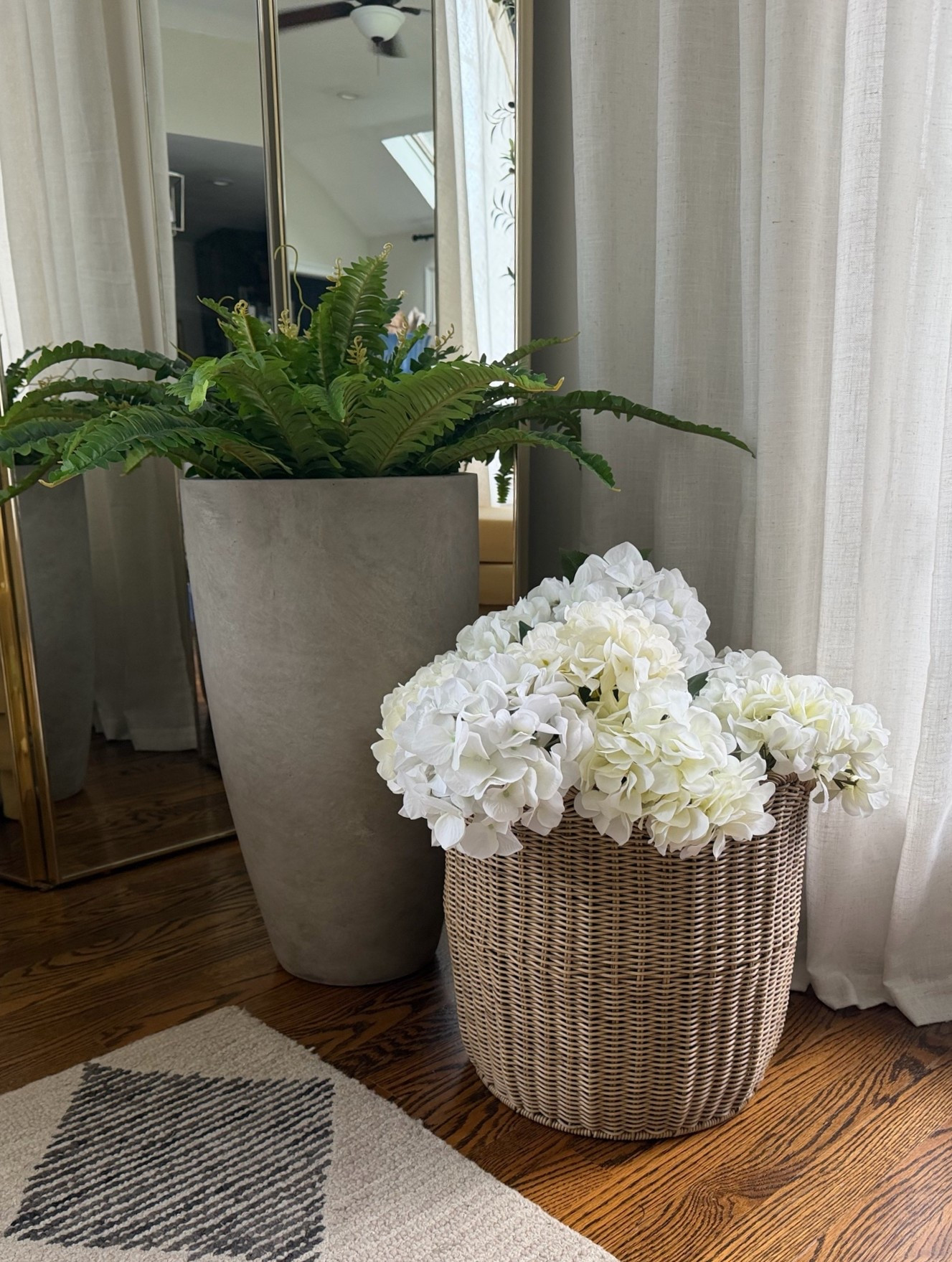 summer home refresh 🌼
feat. realistic artificial plants and florals in bold coastal / cottagecore style planters 🪴

🍋 Pair a 45” boston fern with an oversized concrete or wicker planter (both are uv-safe for outdoors!) to achieve a grandmillennial / coastal cottage style aesthetic this summer!

notes:
👉🏻 wicker planter with scalloped top is from Marshall’s (sold out online)
👉🏻 faux hydrangeas are a mixture of two types from Amazon (linked below)



.
.
summer home decorating tips 
interior design tips
affordable woven planters 
oversized concrete planters
large real touch ferns under $20
coastal style outdoor decor
#summerdecor #summerhome #coastalstyle  #affordabledecor #beachhousestyle #cottagecore
#coastalliving

#LTKdayinmylife #LTKSeasonal #LTKHome