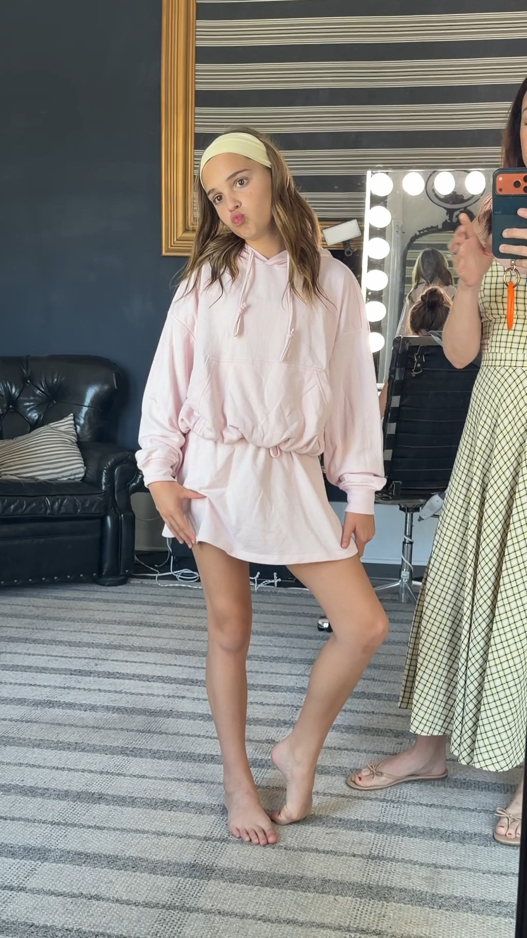 Emma's wearing XS in both