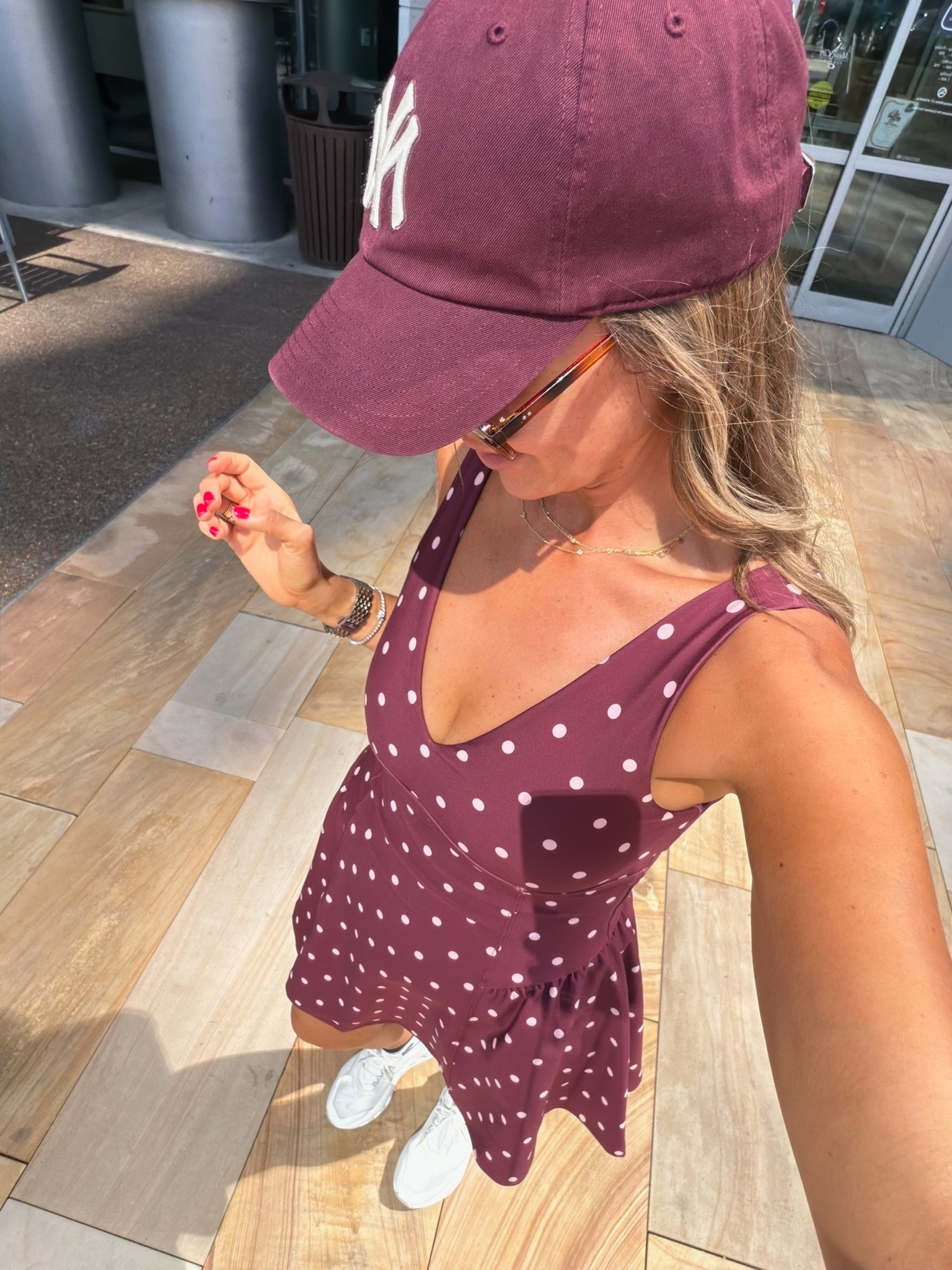 This burgundy polka dot set is such a fun way to wear one of fall’s best colors while it is still warm out. I love the matching top and skirt with white sneakers and a coordinating baseball cap for an easy sporty look.

burgundy matching set, polka dot outfit, fall color trend, casual fall outfit, matching skirt set, sporty fall style, white sneakers outfit, women over 40 style, themominstyle

#LTKootd #LTKActive #LTKSeasonal