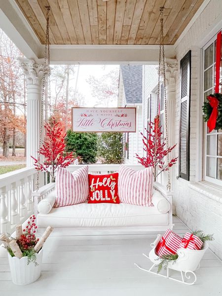 Christmas porch, christmas sign, christmas red pillows, red berry trees

#LTKHoliday #LTKhome #LTKCyberWeek